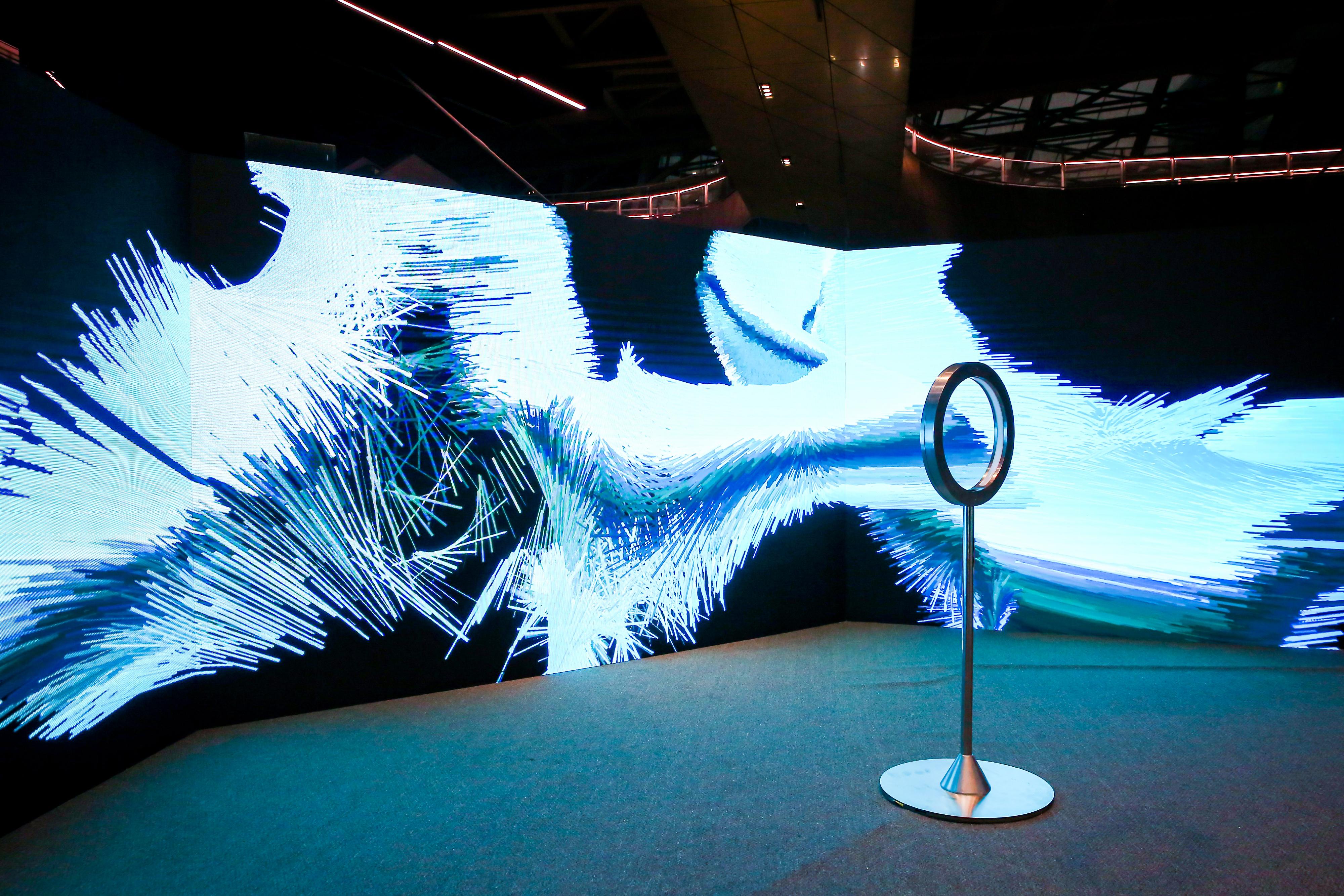 The Shenzhen stop of the "2022 Hong Kong-Macao Visual Art Biennale" is taking place at the Museum of Contemporary Art & Planning in Shenzhen. Photo shows an interactive immersive experience installation, "Cinemorpheque", created by Hong Kong artist Chris Cheung and his team. It was inspired by individual scenes captured from classic Hong Kong films with iconic seasonal backgrounds of spring, summer, autumn and winter. Audiences could move their hands gently in the middle of the ring-shaped device to view the transition of four-season sceneries in classic Hong Kong movies.