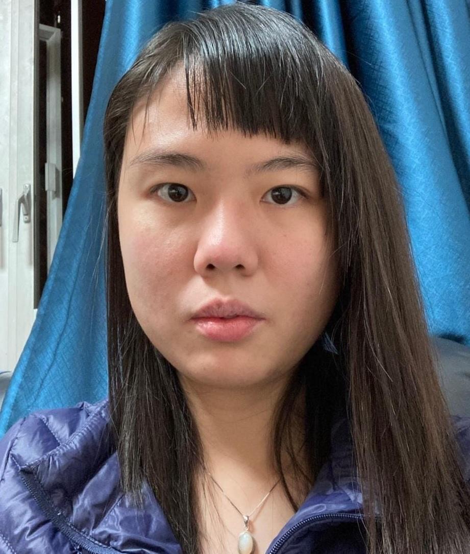Luk Wing-sze, aged 29, is about 1.65 metres tall, 50 kilograms in weight and of medium build. She has a pointed face with yellow complexion and long black hair. She was last seen wearing a blue jacket, black trousers and black sports shoes.