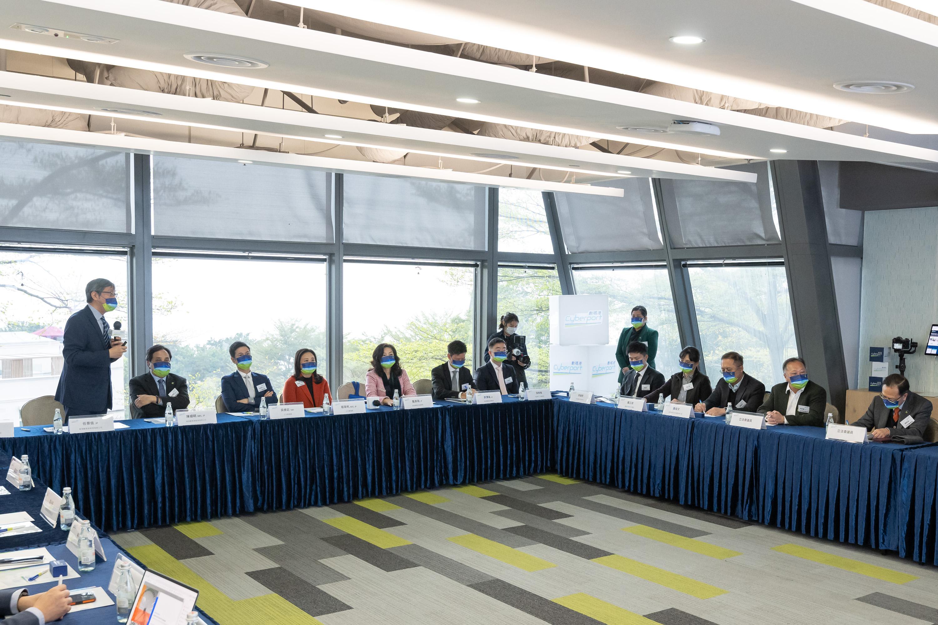 The Legislative Council (LegCo) Subcommittee on Matters Relating to the Development of Smart City visits financial technology (FinTech) and regulatory technology (RegTech) entities at Cyberport today (January 9). Photo shows the Chairman of the Subcommittee, Ms Elizabeth Quat (fourth left); the Deputy Chairman of the Subcommittee, Dr Johnny Ng (third left); and other LegCo Members receiving a briefing by representatives of the Hong Kong Cyberport Management Company Limited on the latest overview of Cyberport.