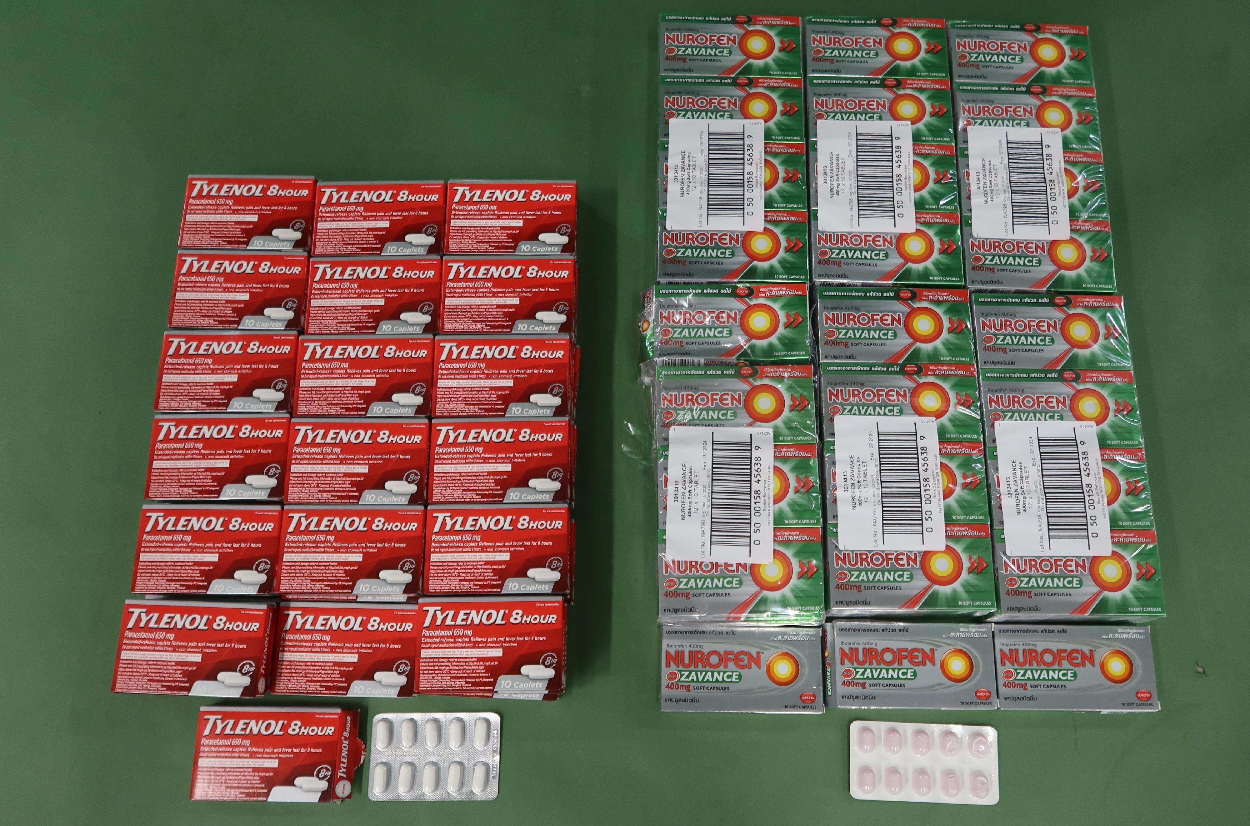 Hong Kong Customs detected four suspected medicine smuggling cases at Hong Kong International Airport on January 9 and yesterday (January 11). More than 12 000 tablets, about 4 388 milliliters and about 186 grams of suspected controlled medicines, with a total estimated market value of about $540,000, were seized. Photo shows the suspected controlled medicines, including pain and fever relief medicines containing paracetamol and cold medicines, seized by Customs officers from the hand-carried baggage of an incoming male passenger.