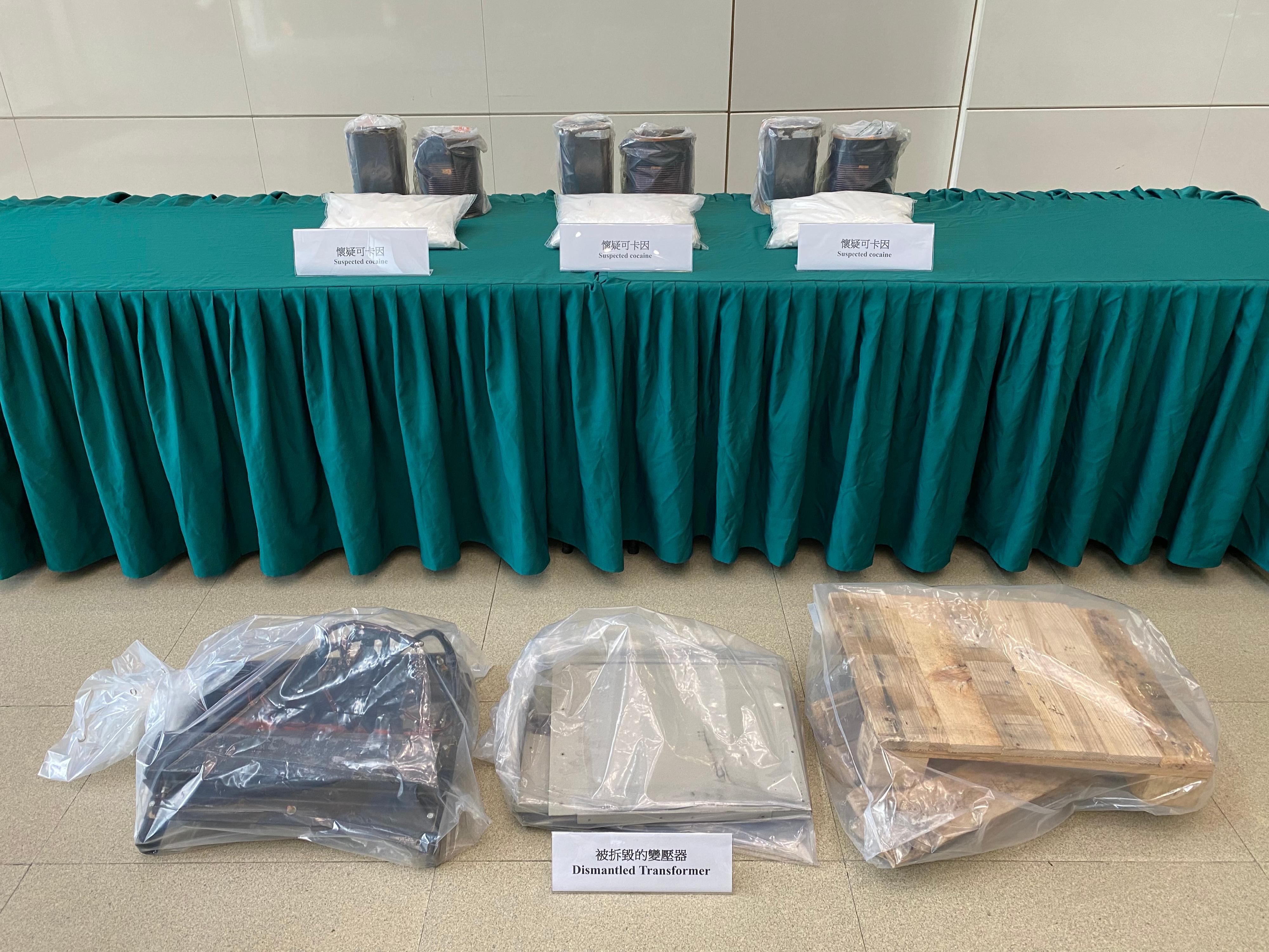 The Customs and Excise Department of Hong Kong (Hong Kong Customs) jointly mounted an anti-narcotics operation, codenamed "Yunzhan-duanliu 2023", with the Anti-Smuggling Bureau of the General Administration of Customs of the People's Republic of China (GACC), the Anti-Smuggling Bureau of the Guangdong Sub-Administration of the GACC, and the Anti-Smuggling Bureau of Shenzhen Customs starting from January 1. On the first day (January 1) of the operation, Hong Kong Customs seized about 9 kilograms of suspected cocaine with an estimated market value of $8 million at Hong Kong International Airport. Photo shows the suspected cocaine found by Customs officers inside a transformer and some of the parts of the transformer.