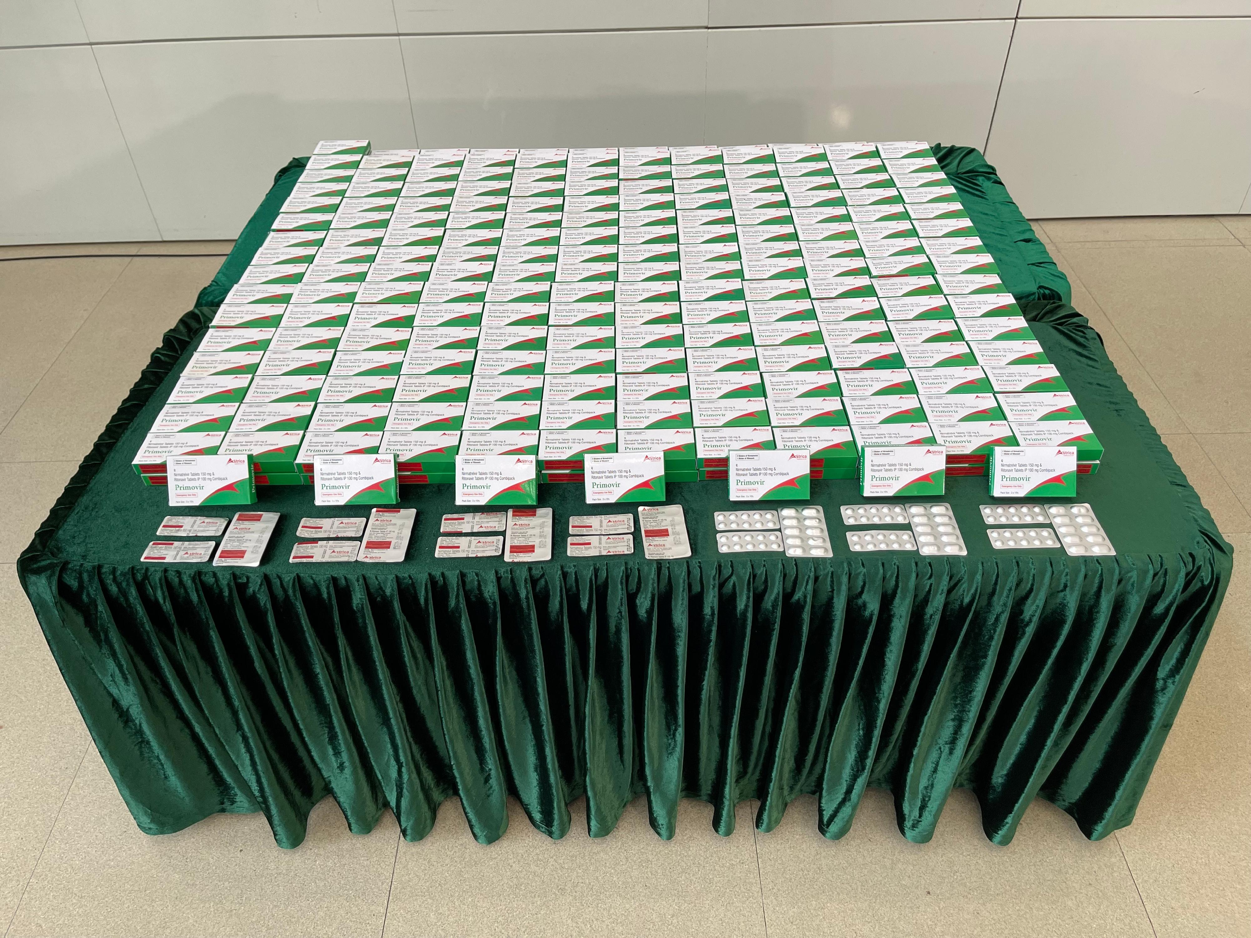 Hong Kong Customs seized about 380 boxes of suspected smuggled COVID-19 oral drugs with an estimated market value of about $500,000 at Hong Kong International Airport and in Tin Shui Wai on January 11 and 14 respectively. Photo shows the suspected smuggled COVID-19 oral drugs seized. 