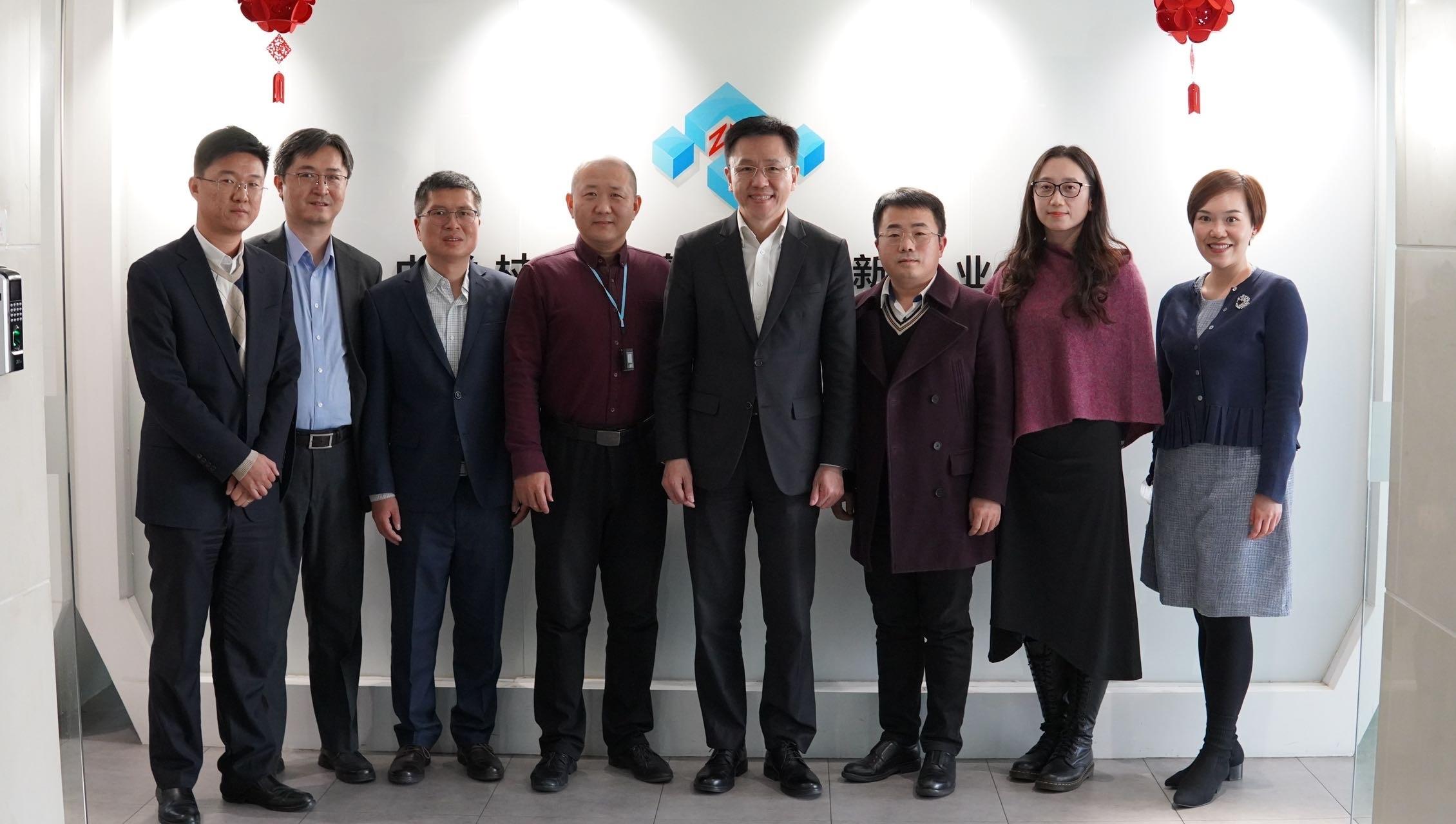 The Secretary for Innovation, Technology and Industry, Professor Sun Dong (fourth right), visits the Zhongguancun Beijing-Hong Kong-Macao Youth Innovation Center in Beijing today (January 17) and is pictured with the Center's staff and representatives of enterprises.