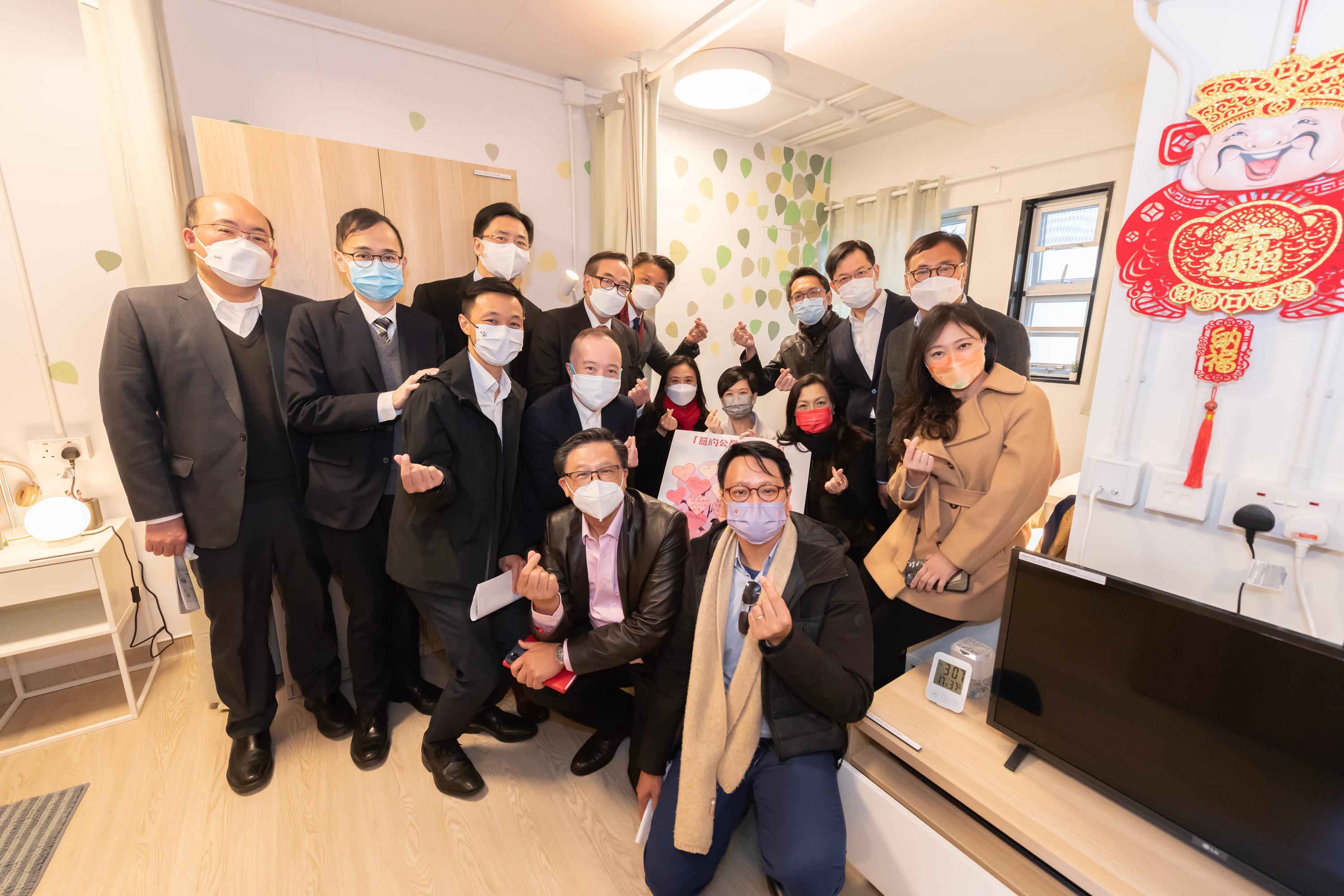 The Legislative Council (LegCo) Public Works Subcommittee visited a Light Public Housing (LPH) mock-up unit today (January 30). Photo shows LegCo Members accompanied by the Secretary for Housing, Ms Winnie Ho (back row, fifth right), touring the LPH mock-up unit. 