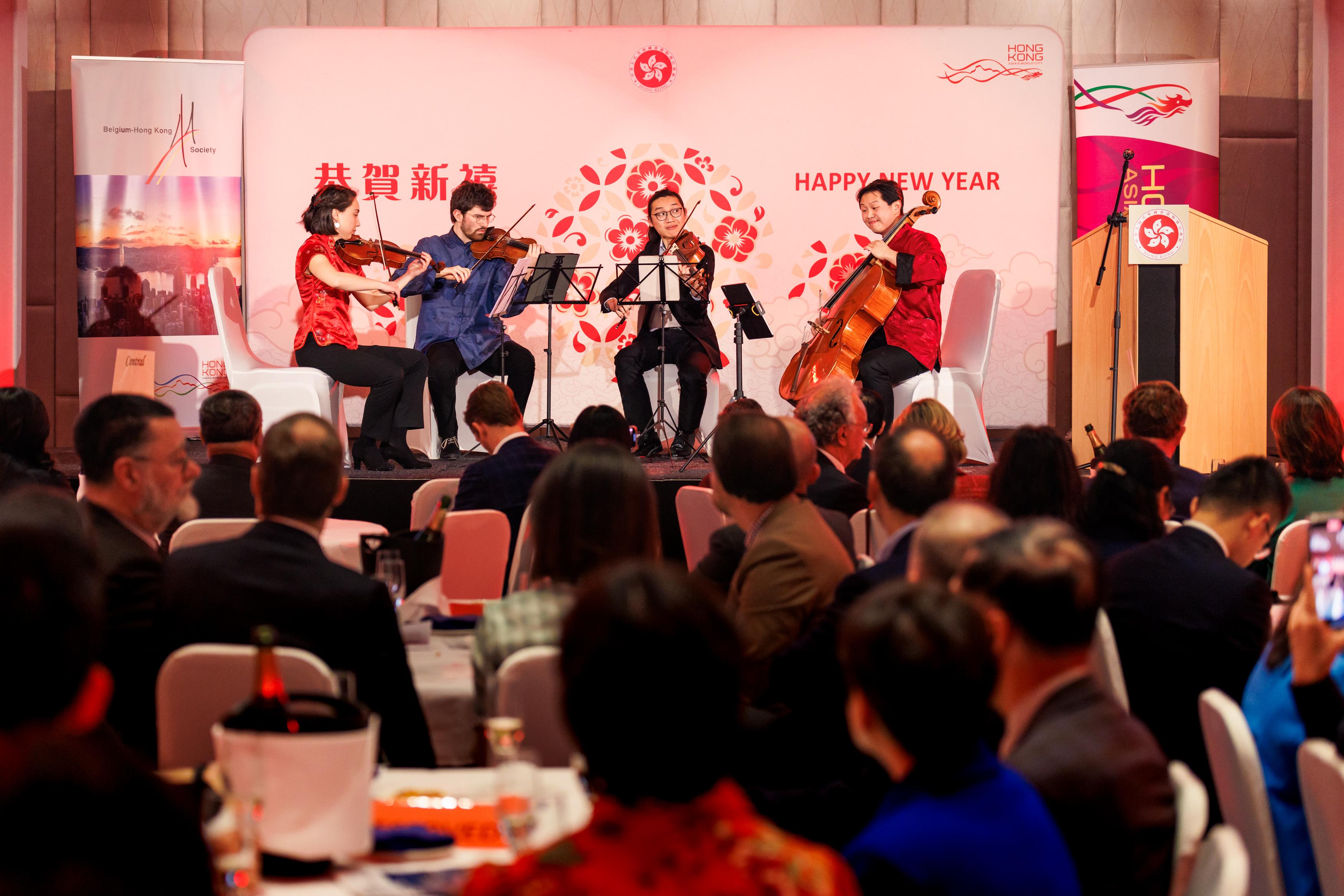 Photo shows a string quartet composed of talented young musicians, invited by HKETO, Brussels, performing for guests at the Chinese New Year reception in Brussels on January 31 (Brussels time).