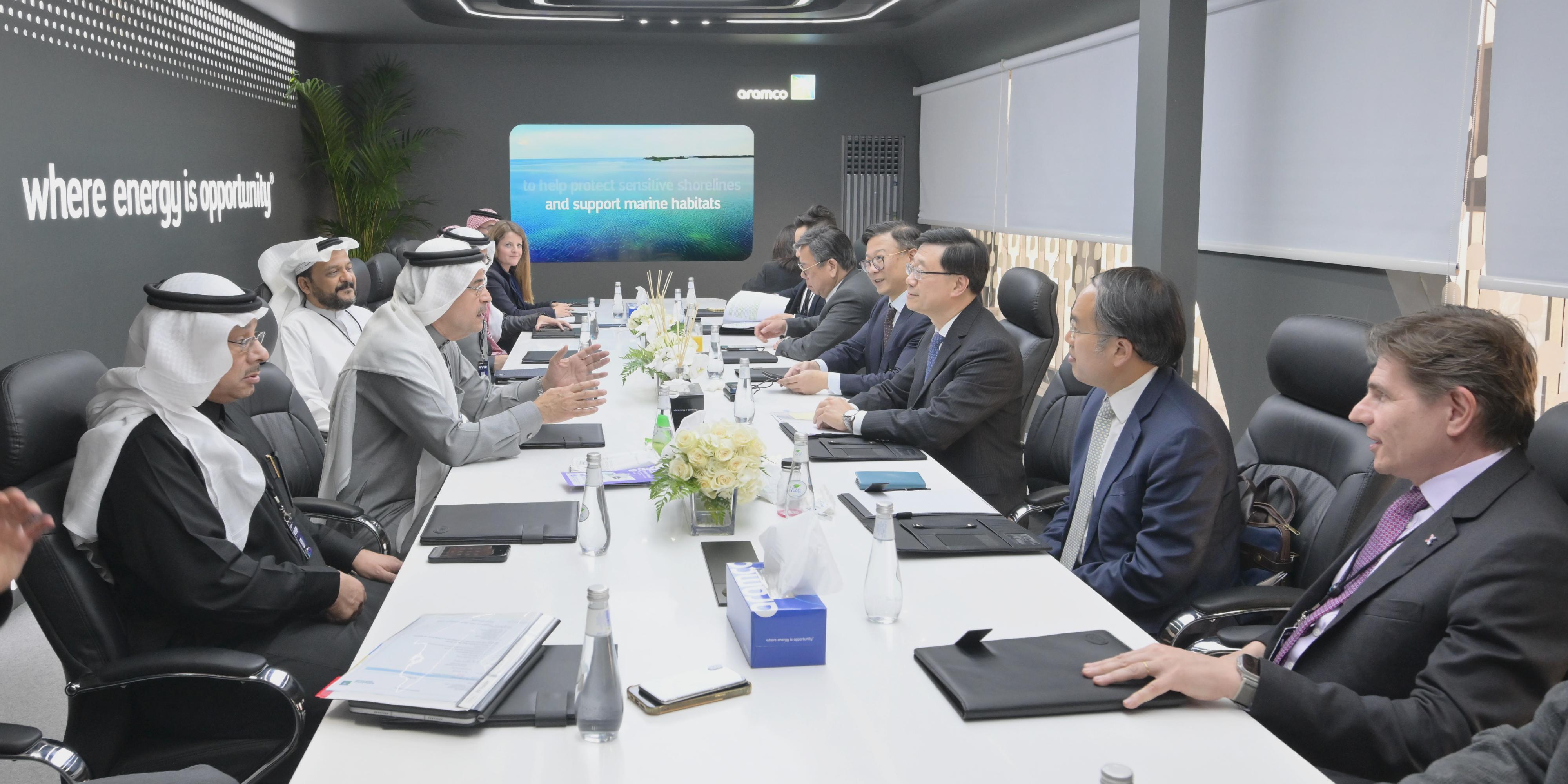 The Chief Executive, Mr John Lee (third right) meets with the President and Chief Executive Officer of Saudi Aramco, Mr Amin H Nasser (second left), in the LEAP 2023 technology conference, Riyadh, Saudi Arabia, today (February 6, Riyadh time). The Deputy Secretary for Justice, Mr Cheung Kwok-kwan (fourth right); the Secretary for Financial Services and the Treasury, Mr Christopher Hui (second right); the Secretary for Commerce and Economic Development, Mr Algernon Yau (fifth right); the Chief Executive Officer of the Hong Kong Exchanges and Clearing Limited, Mr Nicolas Aguzin (first right); and representatives of Saudi Aramco are also present.