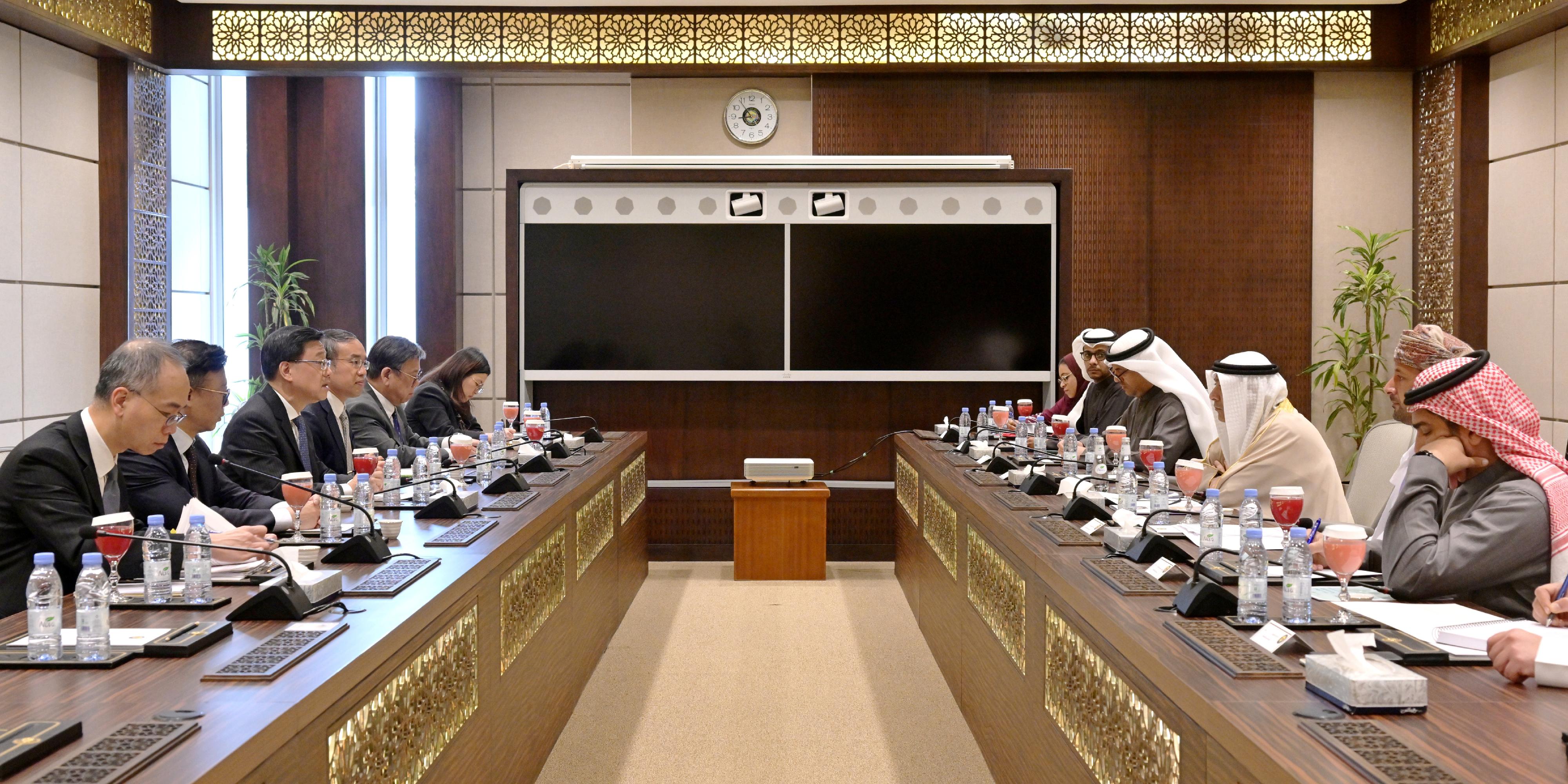 The Chief Executive, Mr John Lee (third left), meets with the Secretary-General of the Cooperation Council for the Arab States of the Gulf, Mr Jasem Mohamed Albudaiwi (third right), in Riyadh, Saudi Arabia, today (February 6, Riyadh time). The Deputy Secretary for Justice, Mr Cheung Kwok-kwan (second left); the Secretary for Financial Services and the Treasury, Mr Christopher Hui (fourth left); the Secretary for Commerce and Economic Development, Mr Algernon Yau (fifth left); the Acting Commissioner for Belt and Road, Mr Johann Wong (first left); and representatives of the Cooperation Council for the Arab States of the Gulf are also present.