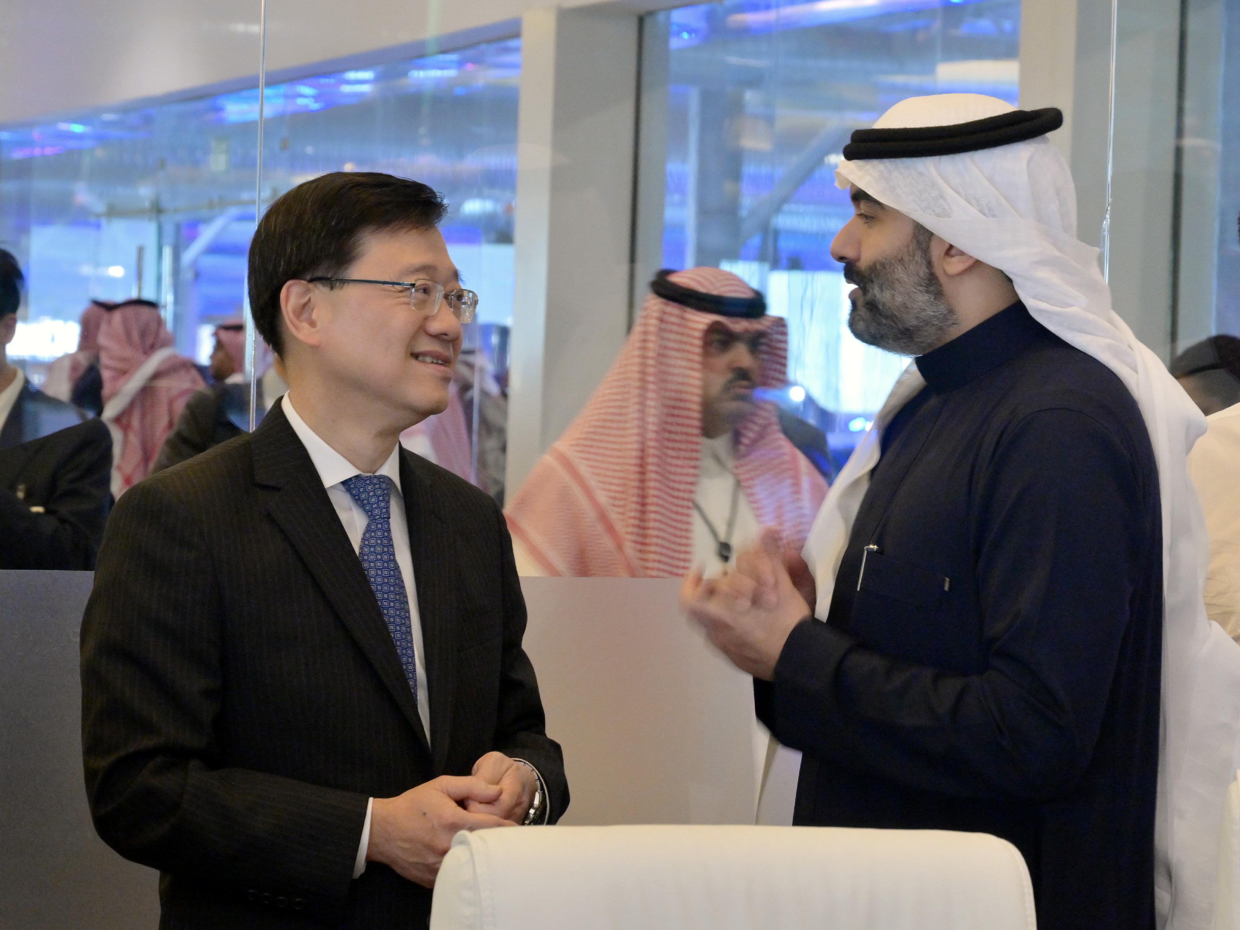The Chief Executive, Mr John Lee (left), meets with the Minister of Communications and Information Technology of Saudi Arabia, Mr Abdullah Alswaha (right), in the LEAP 2023 technology conference, Riyadh, Saudi Arabia, today (February 6, Riyadh time).
