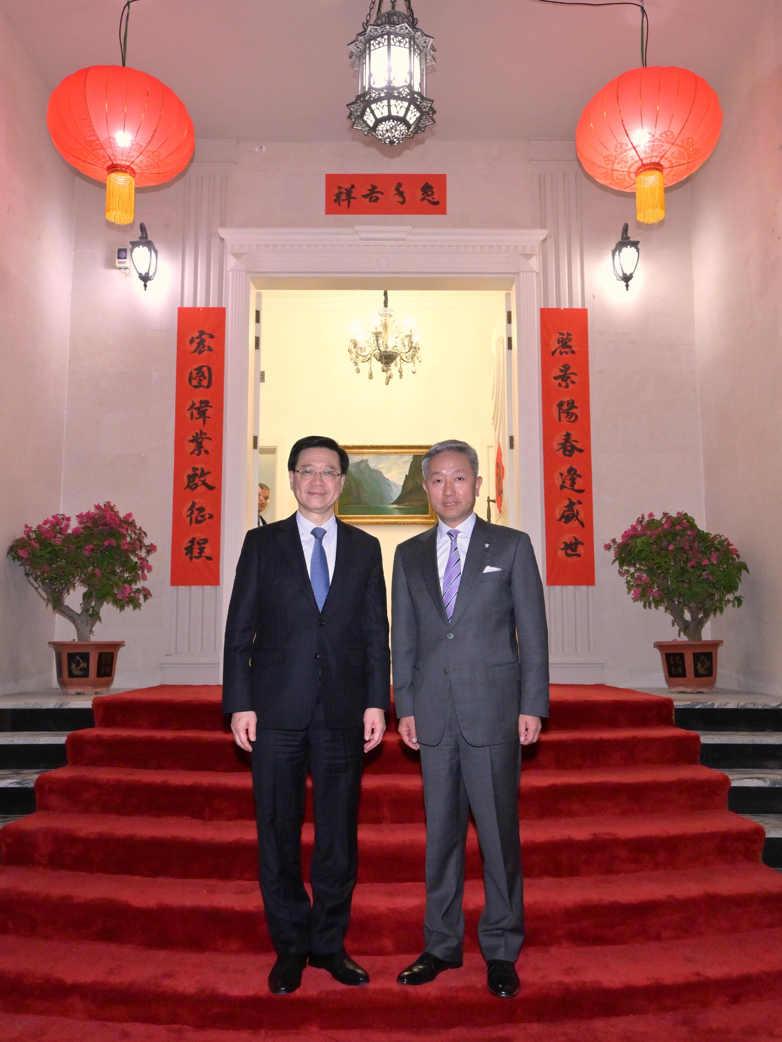 The Chief Executive, Mr John Lee (left), in Abu Dhabi, the United Arab Emirates today (February 7, Abu Dhabi time) attends a dinner hosted by the Ambassador Extraordinary and Plenipotentiary of the People's Republic of China to the United Arab Emirates, Mr Zhang Yiming (right).
