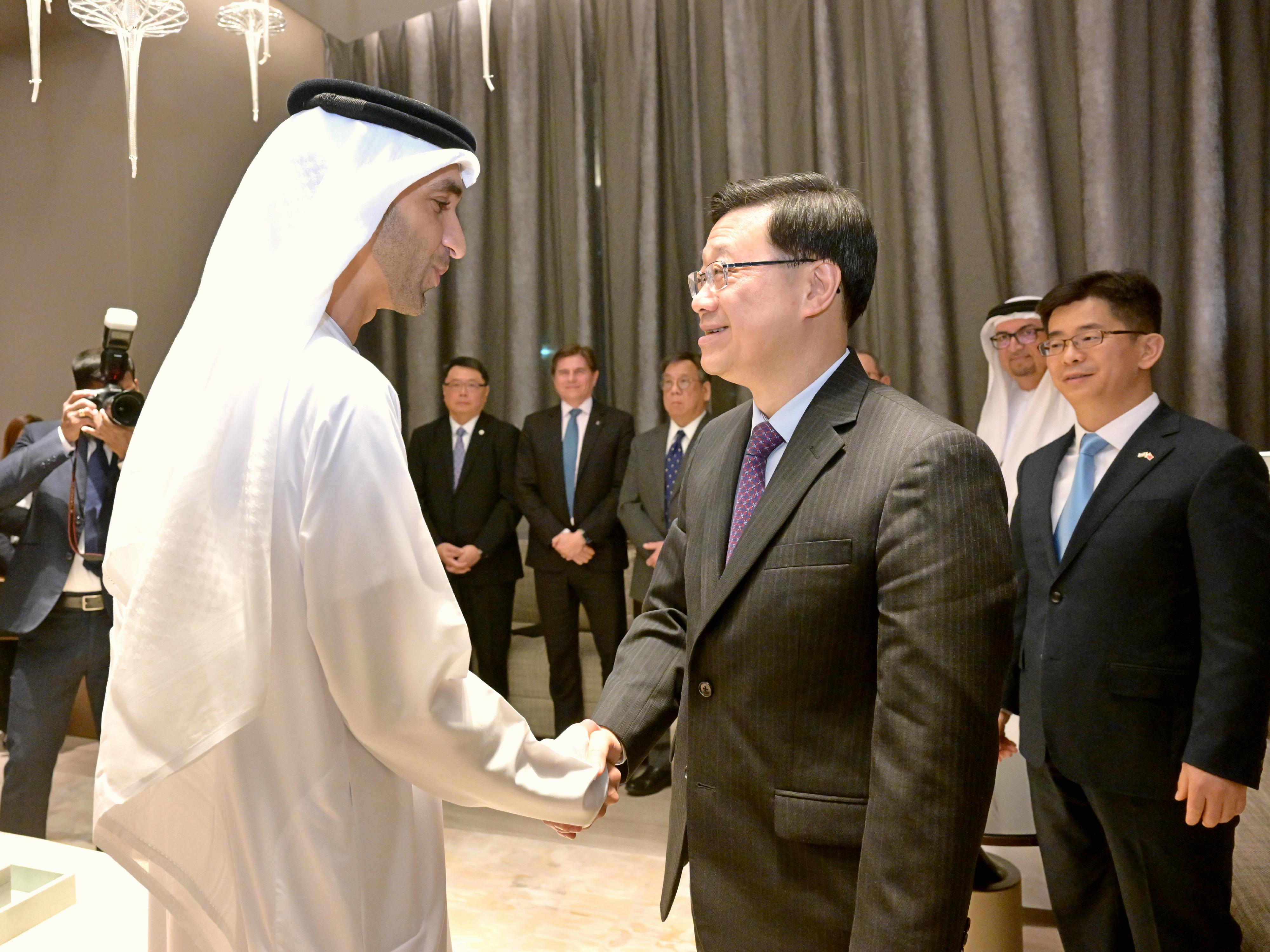 The Chief Executive, Mr John Lee (centre) meets with the Minister of State for Foreign Trade of the United Arab Emirates (UAE), Dr Thani bin Ahmed Al Zeyoudi (left), in Dubai, the UAE, today (February 8, Dubai time).