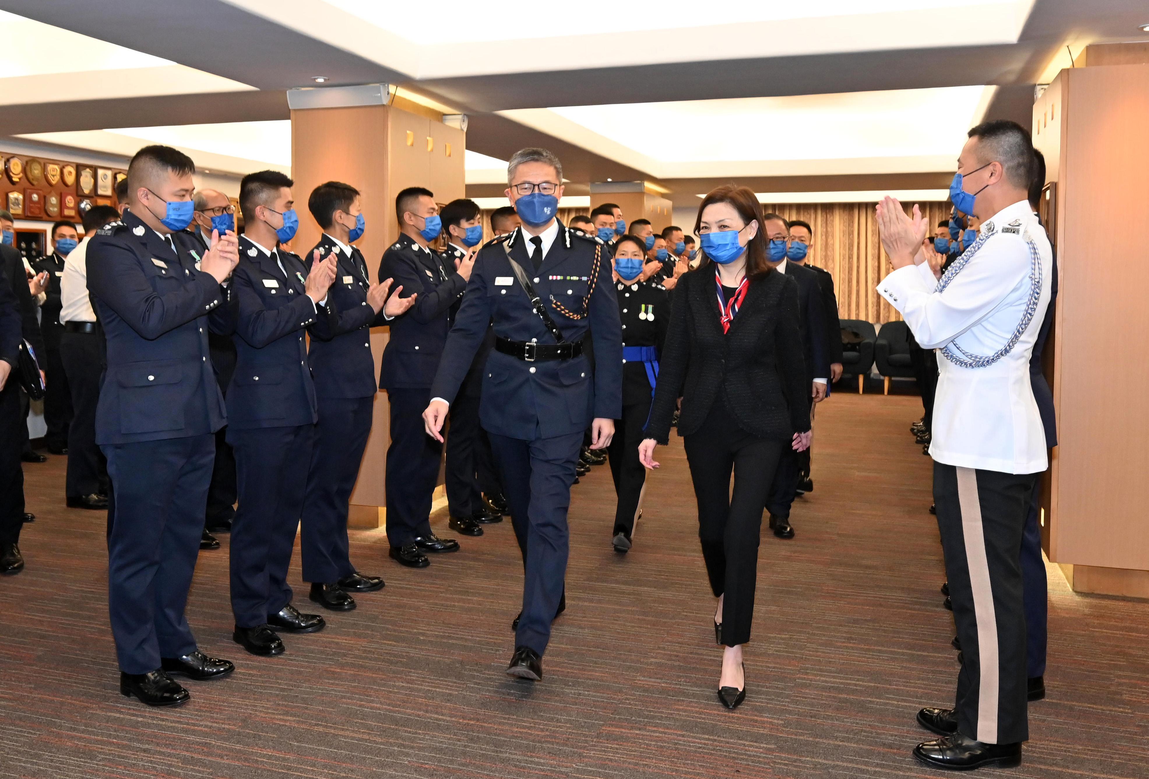 The Chairman of the Independent Police Complaints Council, Ms Priscilla Wong Pui-sze (second right), and the Commissioner of Police, Mr Siu Chak-yee (third right), congratulate the probationary inspectors after the passing-out parade held at the Hong Kong Police College today (February 11).