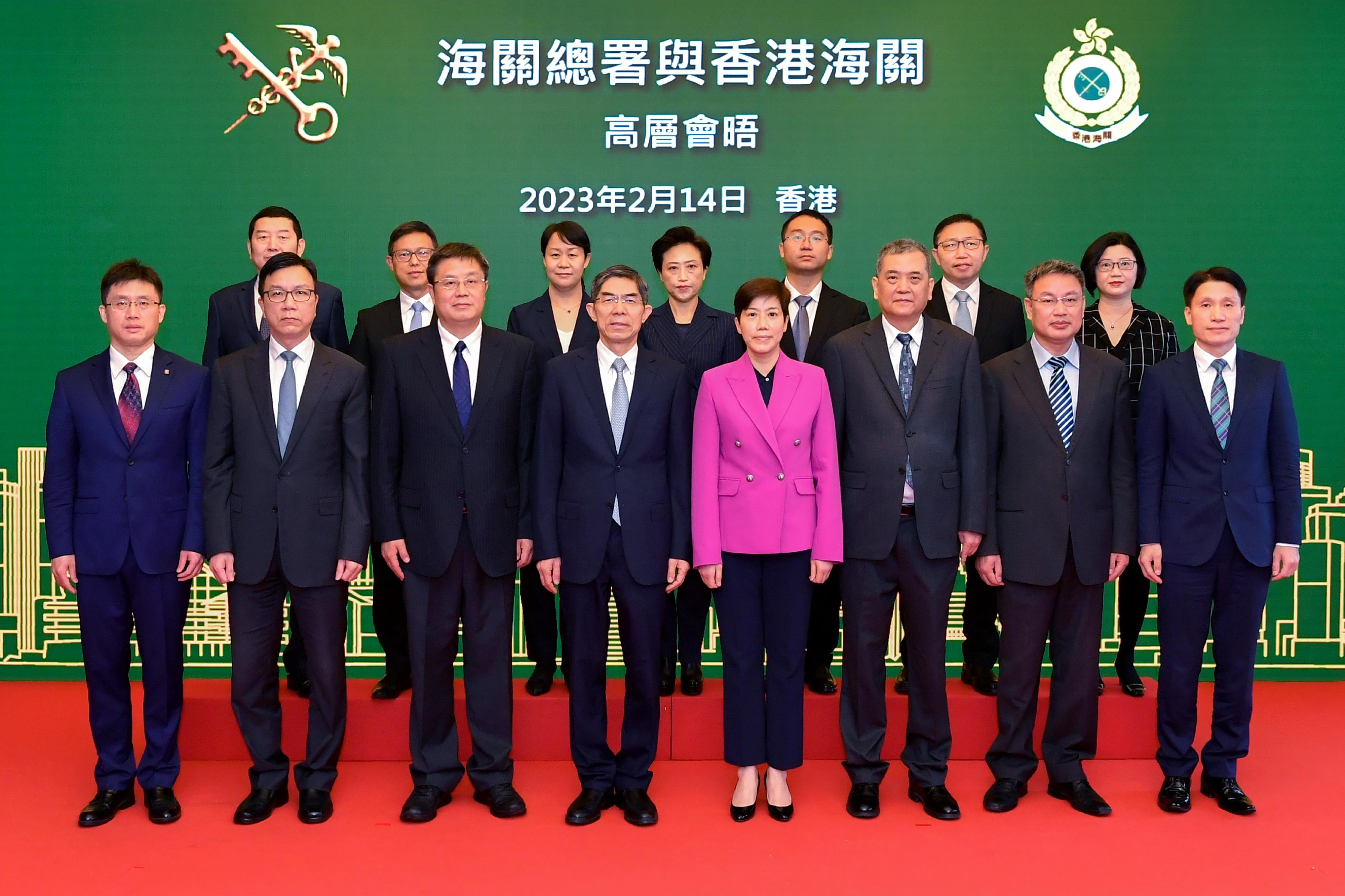 The Commissioner of Customs and Excise, Ms Louise Ho (front row, fourth right), and the Vice-Minister of General Administration of Customs of the People’s Republic of China (GACC), Mr Wang Lingjun (front row, fourth left), signed the Co-operative Arrangement on Deepening Risk Management Co-operation between the GACC and Hong Kong Customs in Hong Kong today (February 14). Other guests attending the signing ceremony include the Deputy Director General of the Department of Finance of the GACC, Mr Xu Mingjie (front row, first left), the Director General of the Department of Commodity Inspection of the GACC, Mr Lin Jiantian (front row, third left), the Chief Engineer of the GACC, Mr Li Wenjian (front row, third right), the Director General of the Department of International Cooperation of the GACC, Mr Zhou Wenyi (front row, second right), the Director of Customs Liaison Division, Police Liaison Department, Liaison Office of the Central People's Government in the Hong Kong Special Administrative Region, Mr Qi Hao (back row, first left), the Director of the Office of Hong Kong, Macao and Taiwan Affairs of the GACC, Ms Zhuang Yan (back row, third left) , the Deputy Director of the General Office of the GACC, Mr Jiang Zhitao (back row, third right) and other senior officials of the Hong Kong Customs.