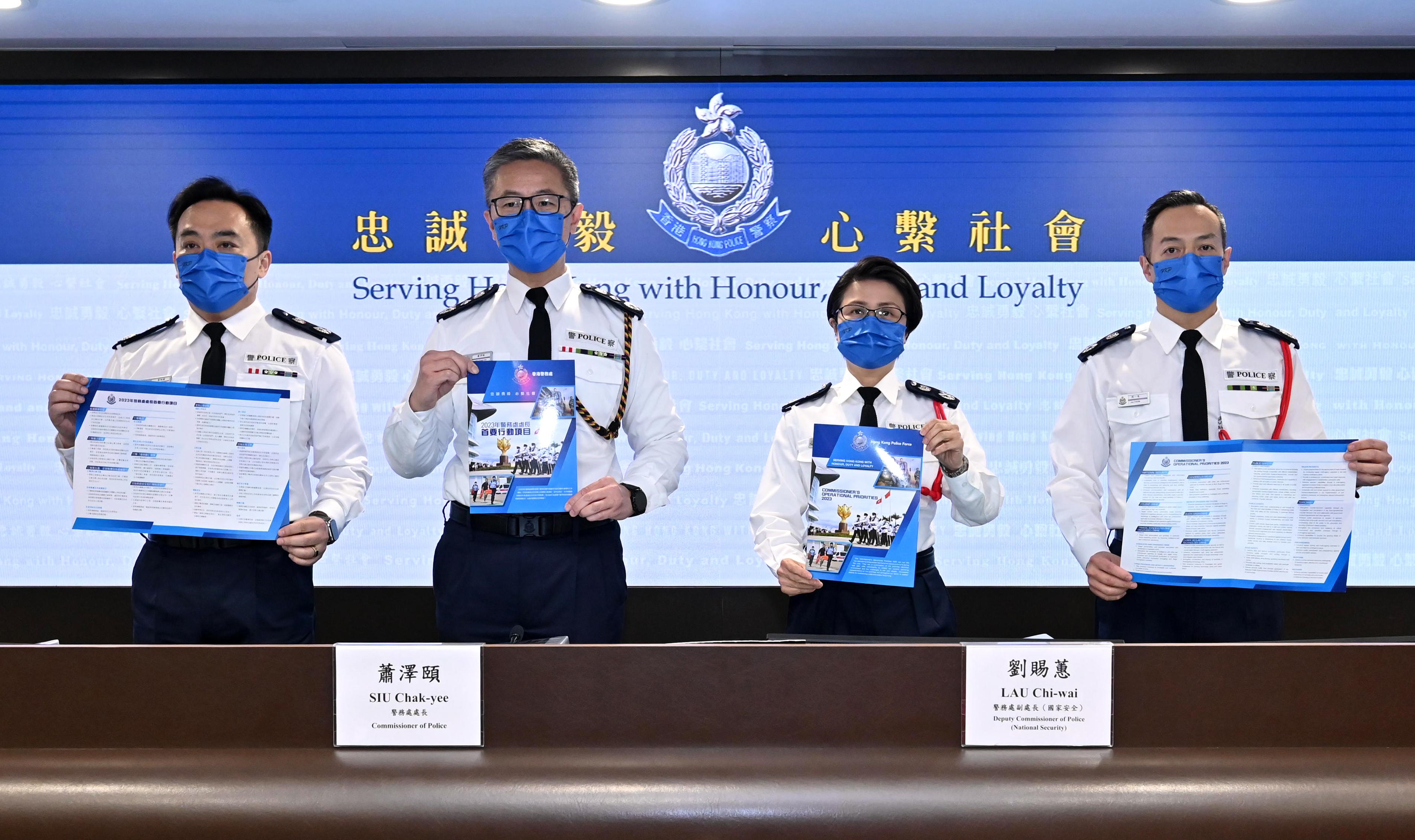 The Commissioner of Police, Mr Siu Chak-yee (second left), reviewed the law and order situation of Hong Kong and the work of the Police in 2022 at a press conference today (February 14). Also present at the press conference were the Deputy Commissioner of Police (National Security), Ms Lau Chi-wai (second right); the Deputy Commissioner of Police (Operations), Mr Yuen Yuk-kin (first left); and the Deputy Commissioner of Police (Management), Mr Chow Yat-ming (first right).