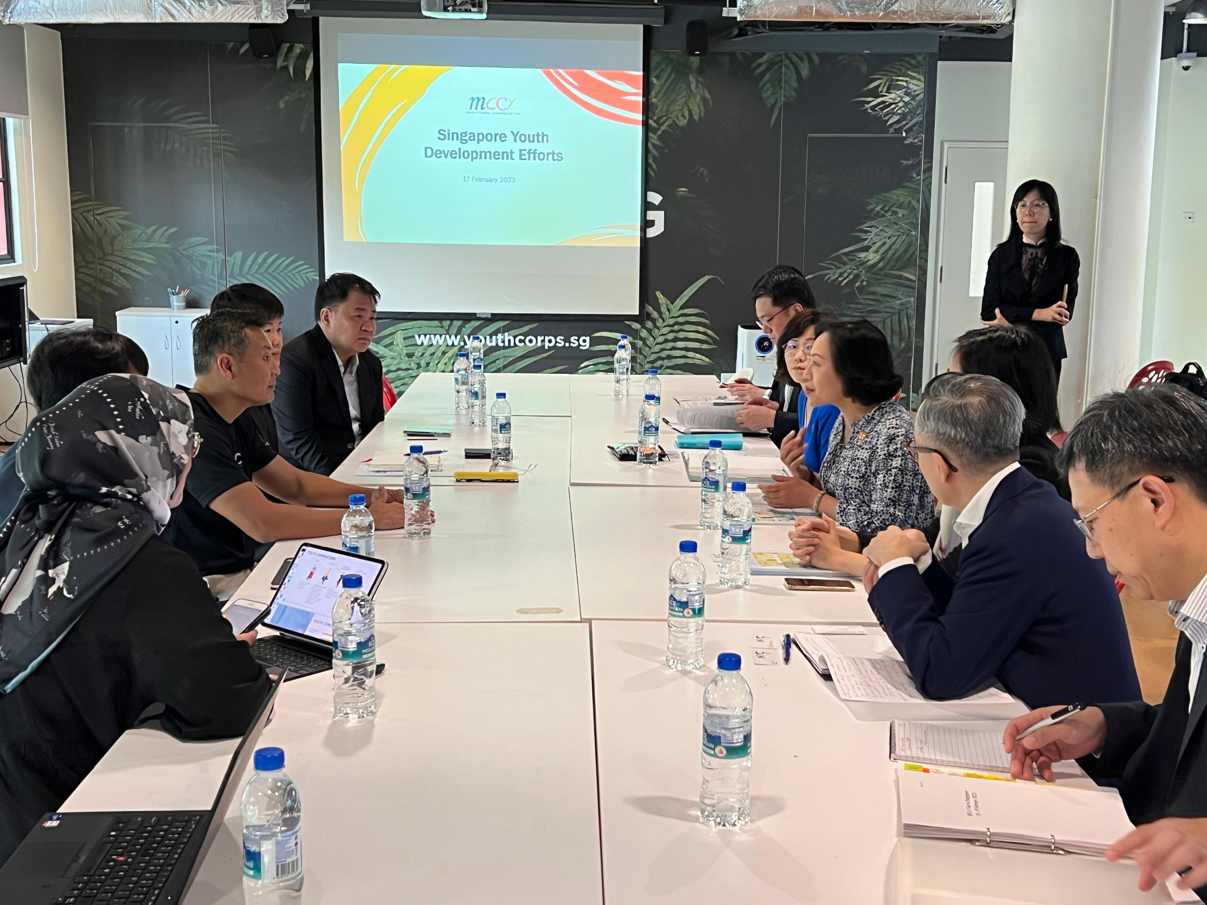 The Secretary for Home and Youth Affairs, Miss Alice Mak, continued her visit in Singapore today (February 17). Photo shows Miss Mak (fourth right) meeting with the Chief Executive Officer of the National Youth Council, Mr David Chua (third left), to discuss items of mutual interest.