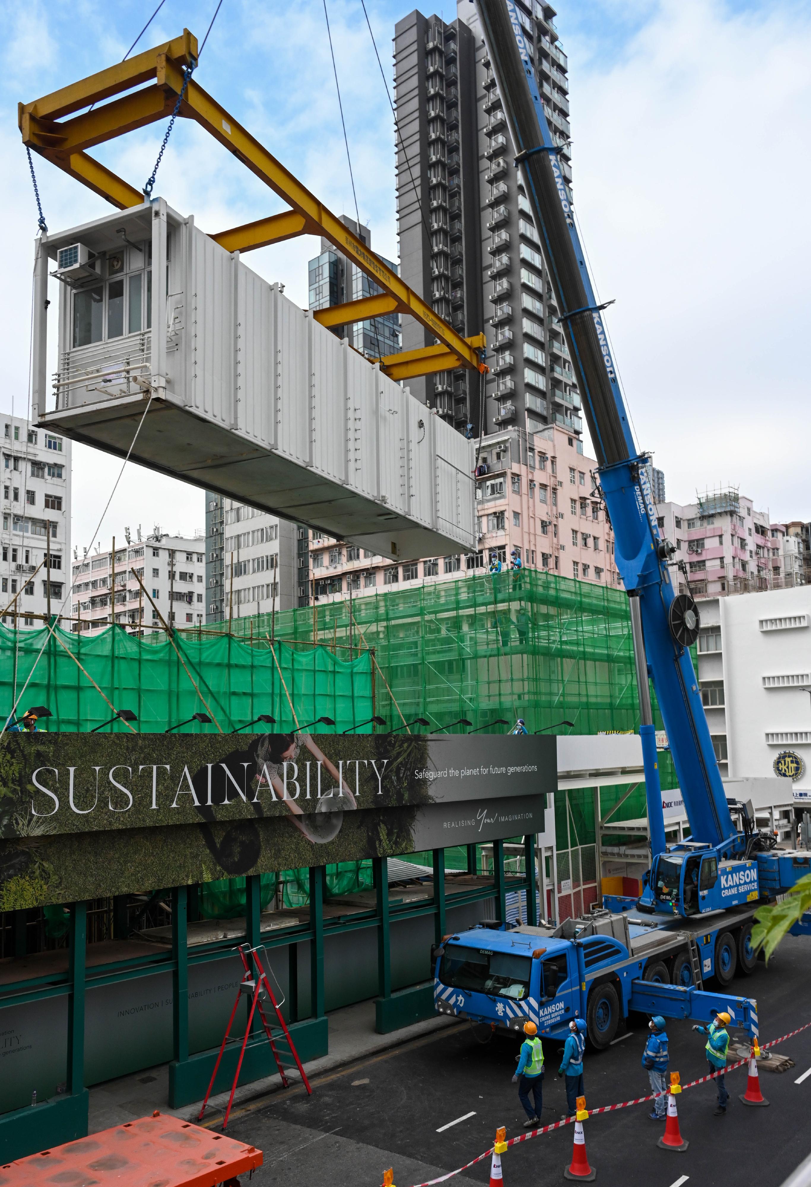 The relocation of Nam Cheong 220, the first transitional housing project in Hong Kong adopting the modular integrated construction approach, started today (February 18). Photo shows the modules which will be relocated to another transitional housing project in Wong Yue Tan, Tai Po, for reassembling and reusing.
