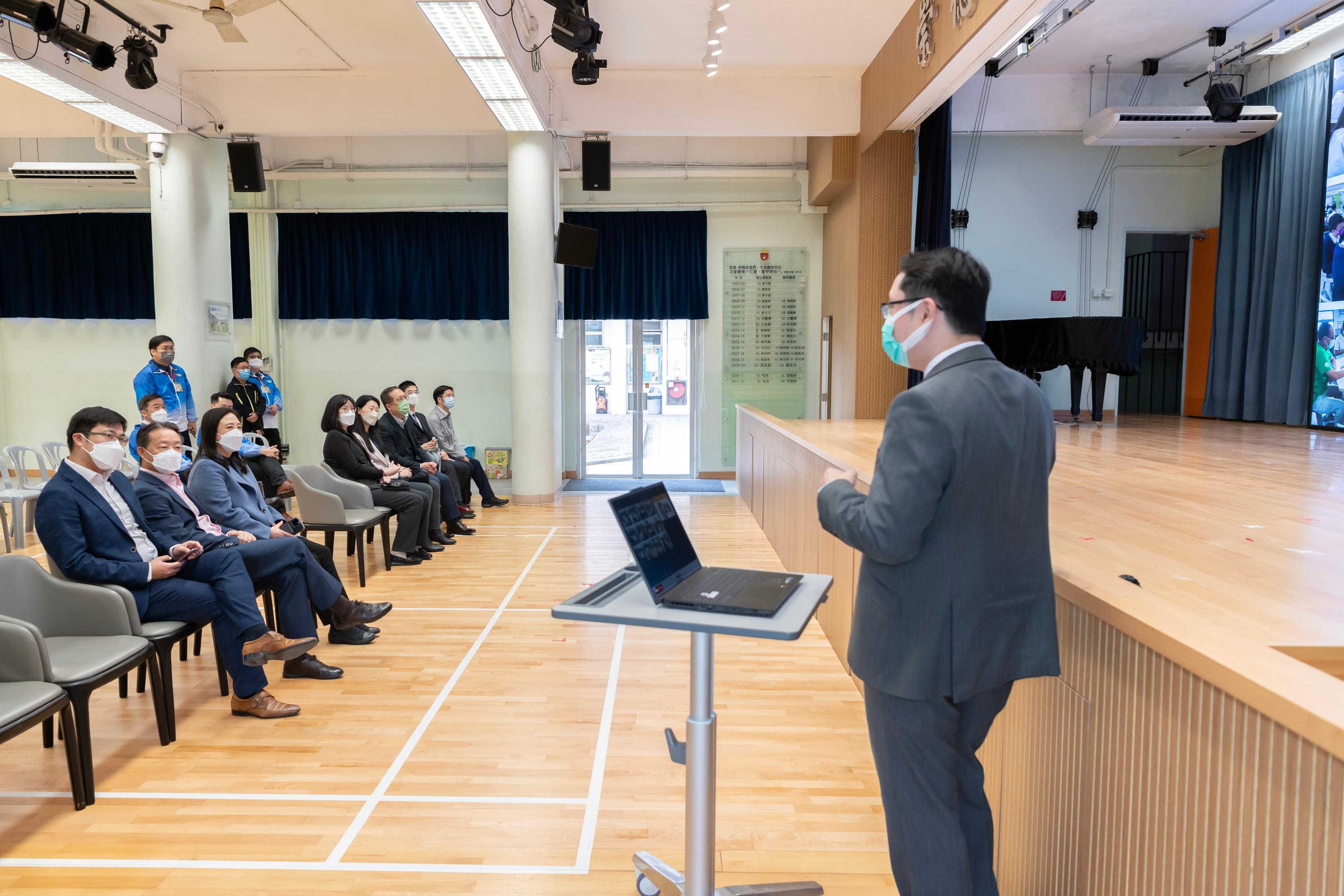 The Legislative Council Subcommittee on Matters Relating to the Development of Smart City visited the HKSKH Bishop Hall Secondary School today (February 24). Photo shows Members receiving a briefing from representatives of the school on the overview of its STEAM education.