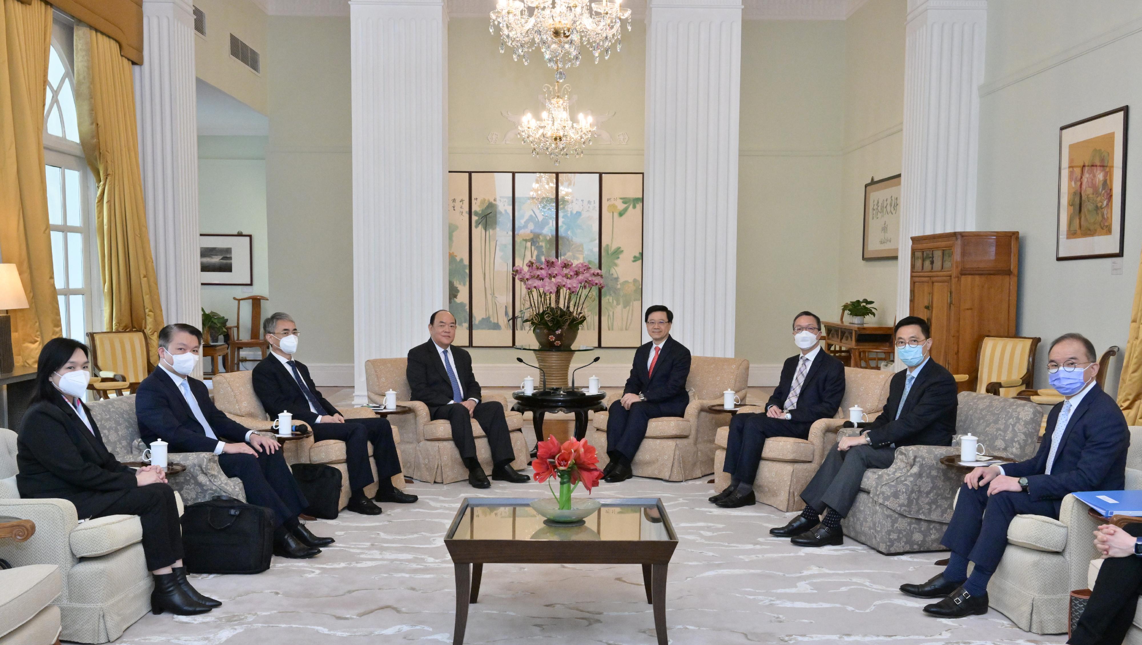 The Chief Executive, Mr John Lee (fourth right), met with the Chief Executive of the Macao Special Administrative Region, Mr Ho Iat-seng (fourth left), at Government House today (February 25). The Secretary for Justice, Mr Paul Lam, SC (third right); the Secretary for Culture, Sports and Tourism, Mr Kevin Yeung (second right); the Secretary for Constitutional and Mainland Affairs, Mr Erick Tsang Kwok-wai (first right), and the Director of the Chief Executive's Office, Ms Carol Yip, also attended the meeting.
