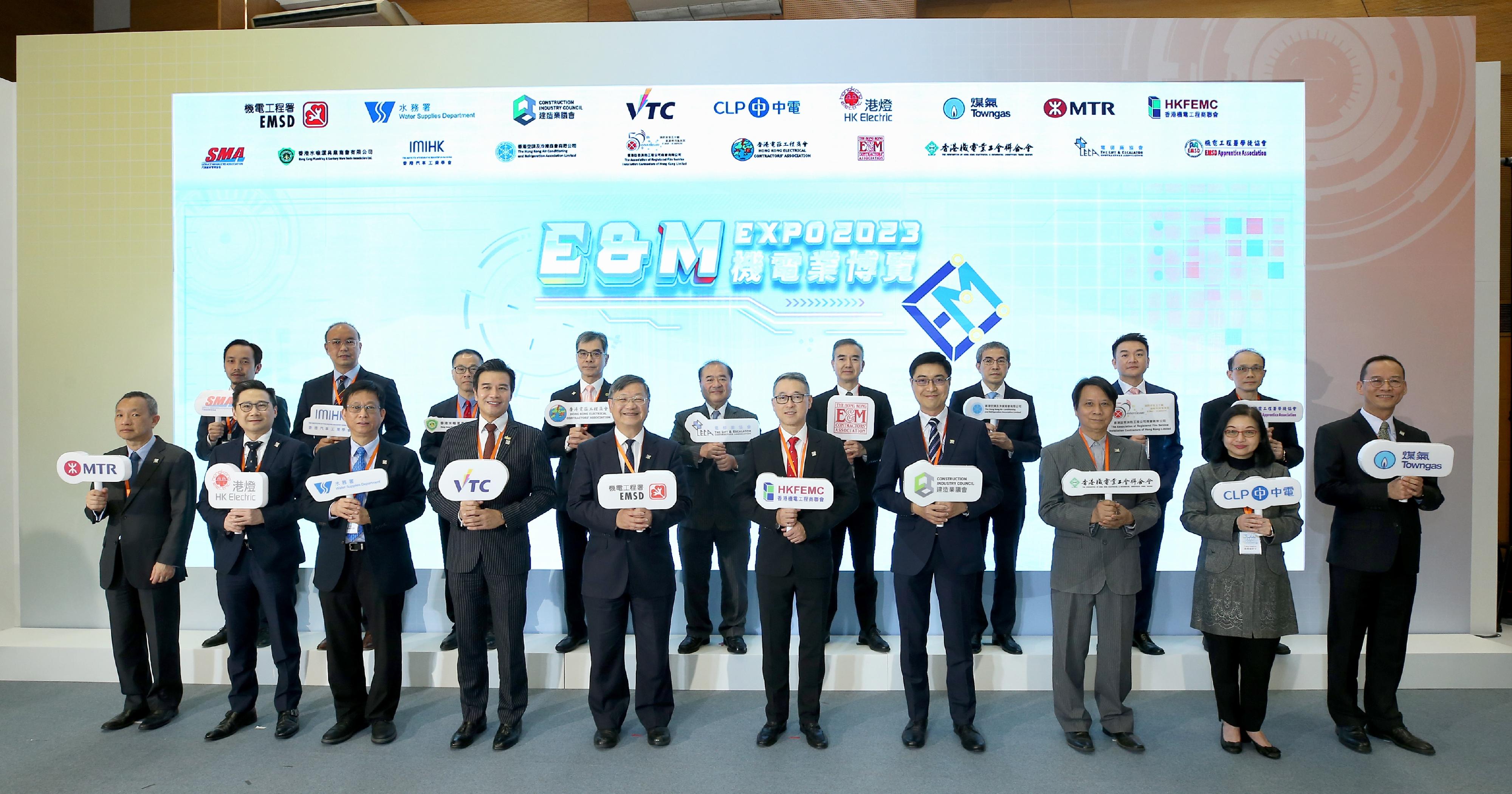 The Electrical and Mechanical Services Department and the Hong Kong Electrical and Mechanical Trade Promotion Working Group today (March 3) jointly held the Electrical and Mechanical Expo 2023. Photo shows the Director of Electrical and Mechanical Services, Mr Eric Pang (front row, fifth left), the representative of the Hong Kong Electrical and Mechanical Trade Promotion Working Group and President of the Hong Kong Federation of Electrical and Mechanical Contractors Limited, Mr Rocky Poon (front row, fifth right), and other representatives of the Working Group at the opening ceremony.