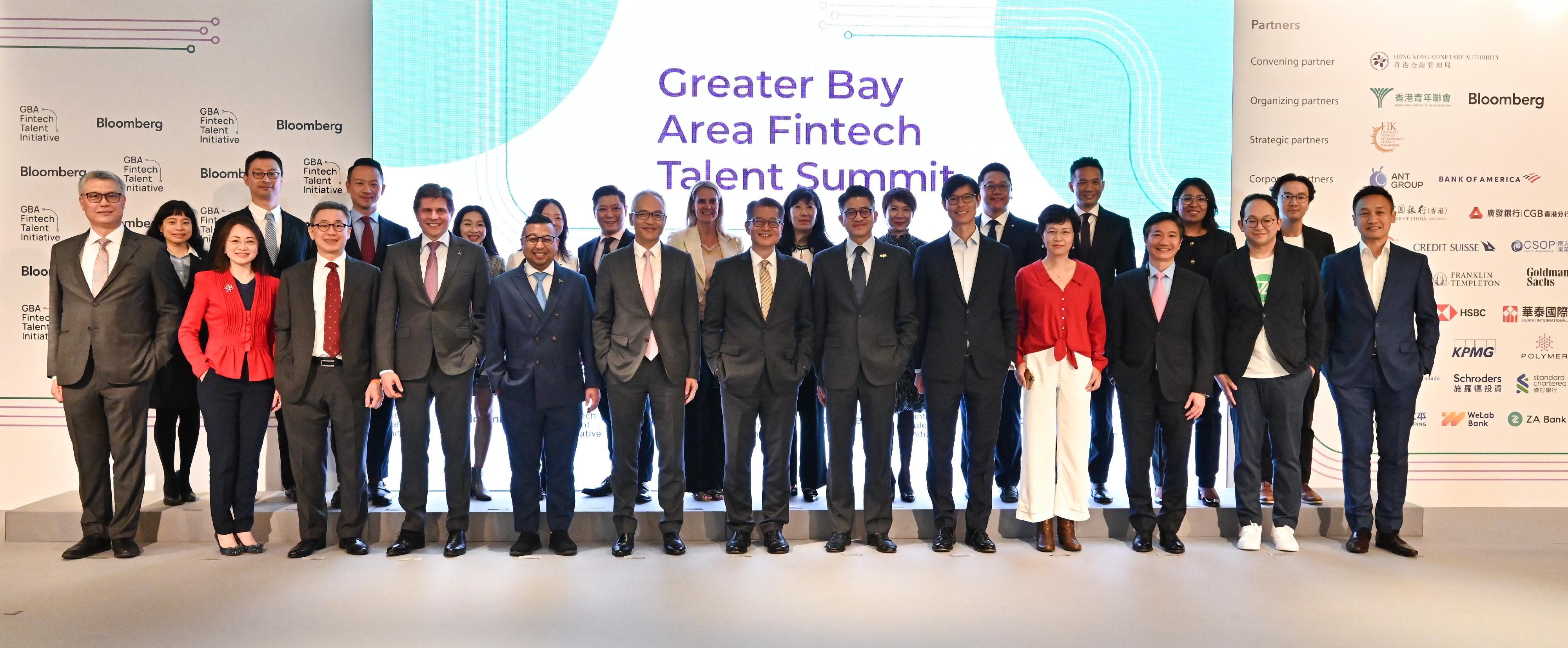 The Financial Secretary, Mr Paul Chan, attended the Greater Bay Area Fintech Talent Summit today (March 9). Photo shows (front row, from sixth left) Deputy Chief Executive of the Hong Kong Monetary Authority Mr Howard Lee; Mr Chan; the Head of Asia Pacific, Bloomberg, Mr Bing Li, and other guests at the event.