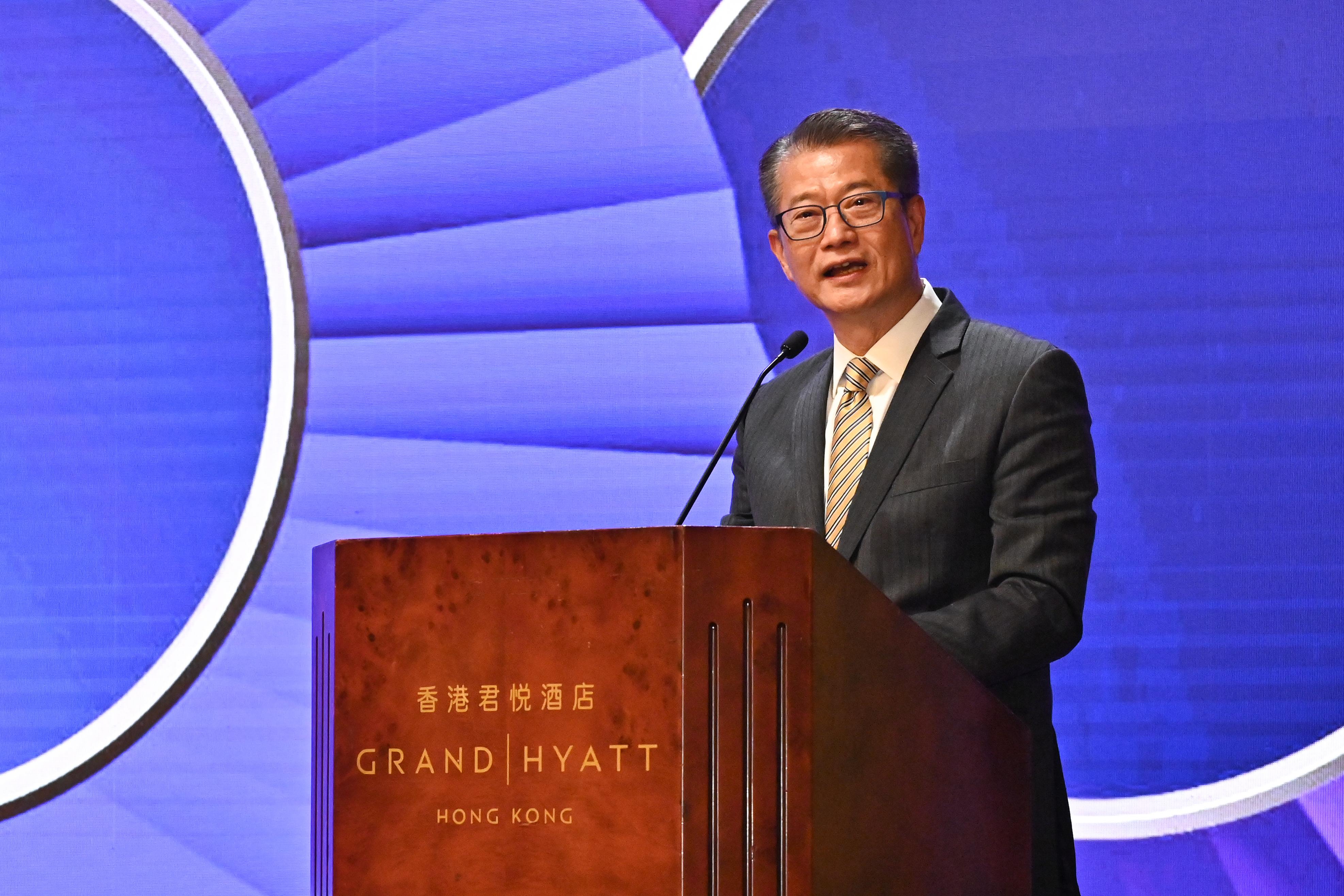 The Financial Secretary, Mr Paul Chan, speaks at the Chinese University of Hong Kong Business School 60th Anniversary Reception today (March 9).