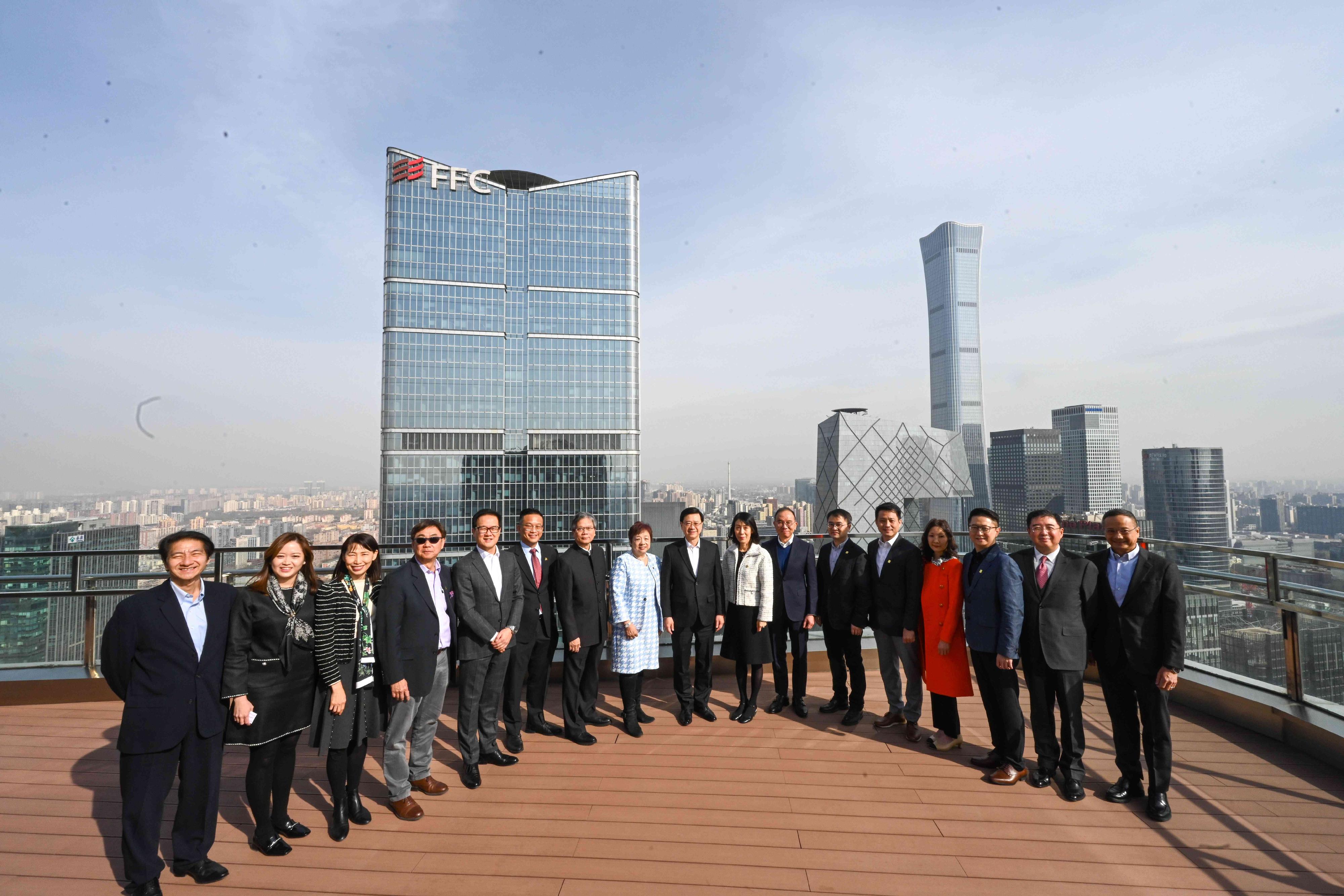 The Chief Executive, Mr John Lee, attended a tea gathering in Beijing with members of the Hong Kong Chamber of Commerce in China this afternoon (March 13). Photo shows Mr Lee (ninth right); the Secretary for Constitutional and Mainland Affairs, Mr Erick Tsang Kwok-wai (seventh right); the Director of the Chief Executive's Office, Ms Carol Yip (third left); the Director of the Office of the Government of the Hong Kong Special Administrative Region in Beijing, Mr Rex Chang (first left); and the Chairman of the Hong Kong Chamber of Commerce, Ms Judith Yu (eighth right).