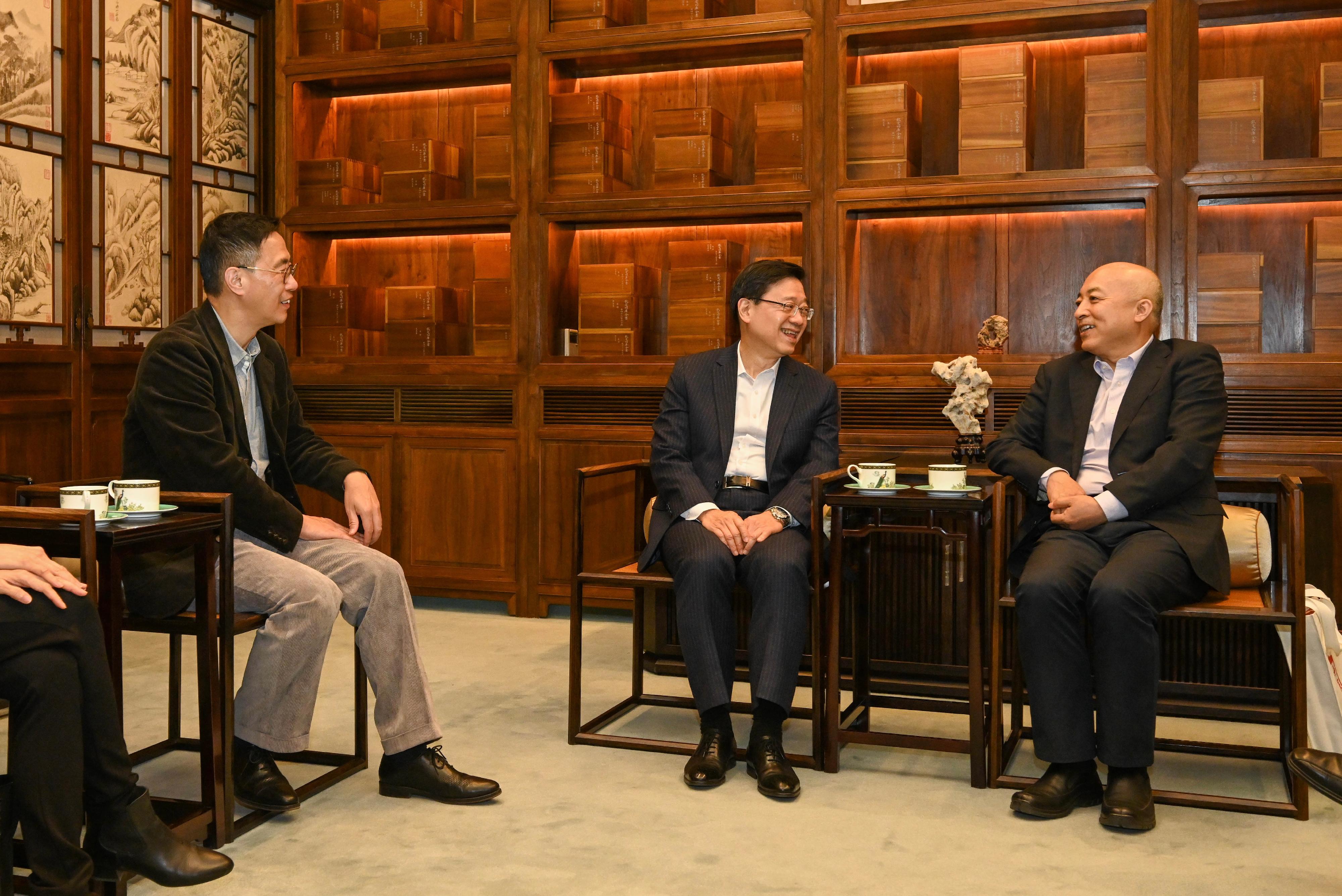 The Chief Executive, Mr John Lee, visited the Palace Museum  in Beijing this afternoon (March 14). Photo shows Mr Lee (centre) meeting with the Director of the Palace Museum, Dr Wang Xudong (right). Also joining the meeting is the Secretary for Culture, Sports and Tourism, Mr Kevin Yeung (left).