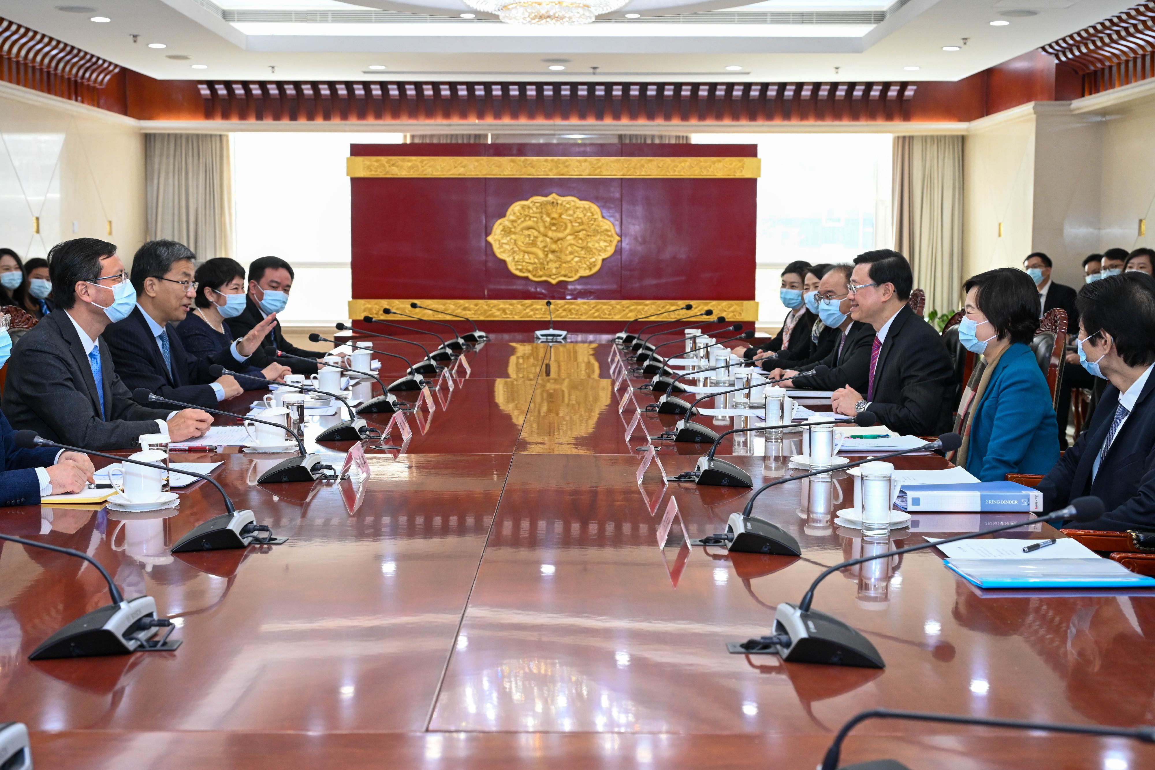 The Chief Executive, Mr John Lee (third right), meets with the Minister of Education, Mr Huai Jinpeng (second left), in Beijing this morning (March 16). Also attending the meeting are the Secretary for Constitutional and Mainland Affairs, Mr Erick Tsang Kwok-wai (fourth right); and the Secretary for Education, Dr Choi Yuk-lin (second right).