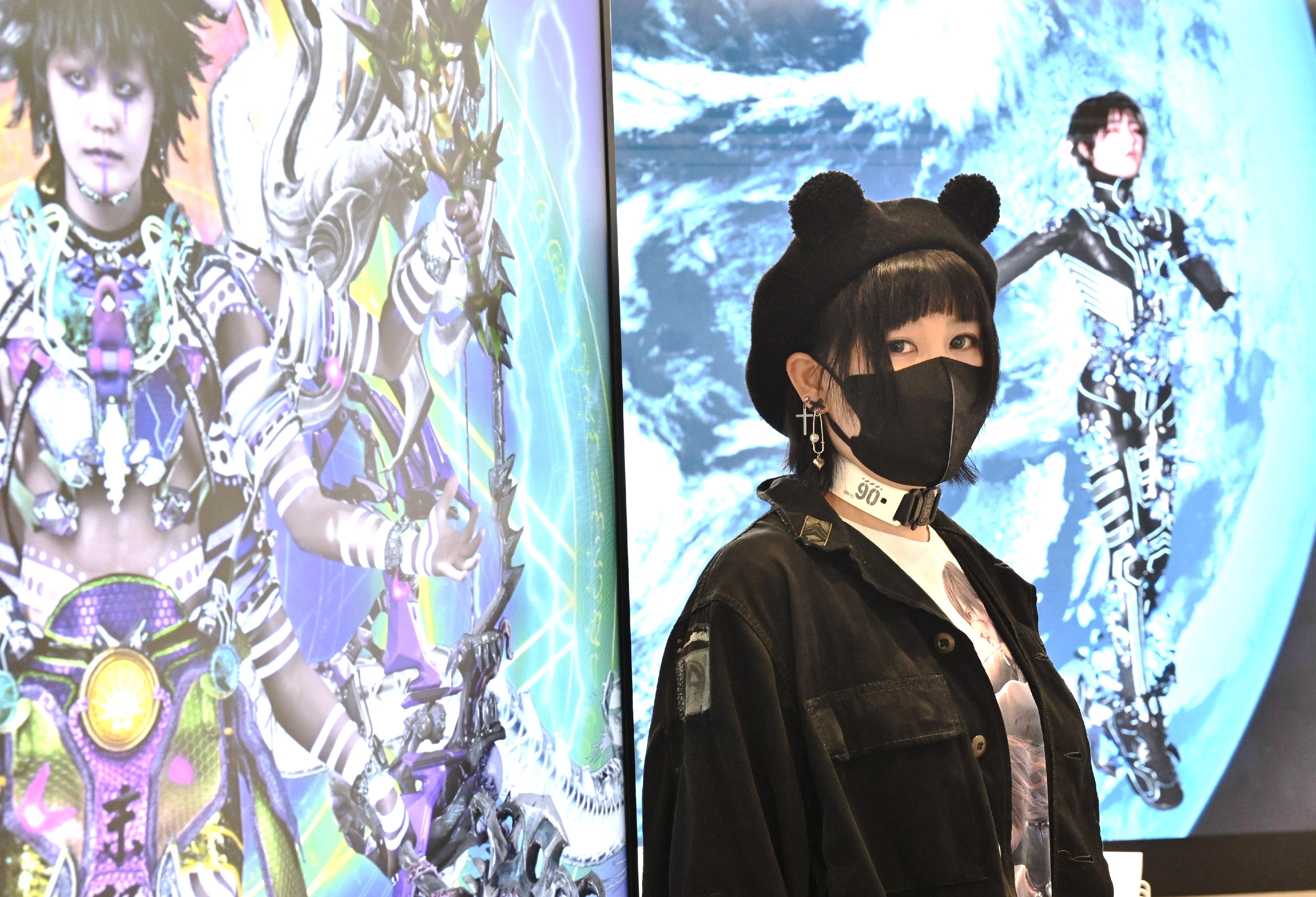 The "DOKU Hong Kong Experience Centre" exhibition by Mainland new media artist Lu Yang will be on display from tomorrow (March 18) in Oi! Glassie. Photo shows the artist Lu with the artwork.