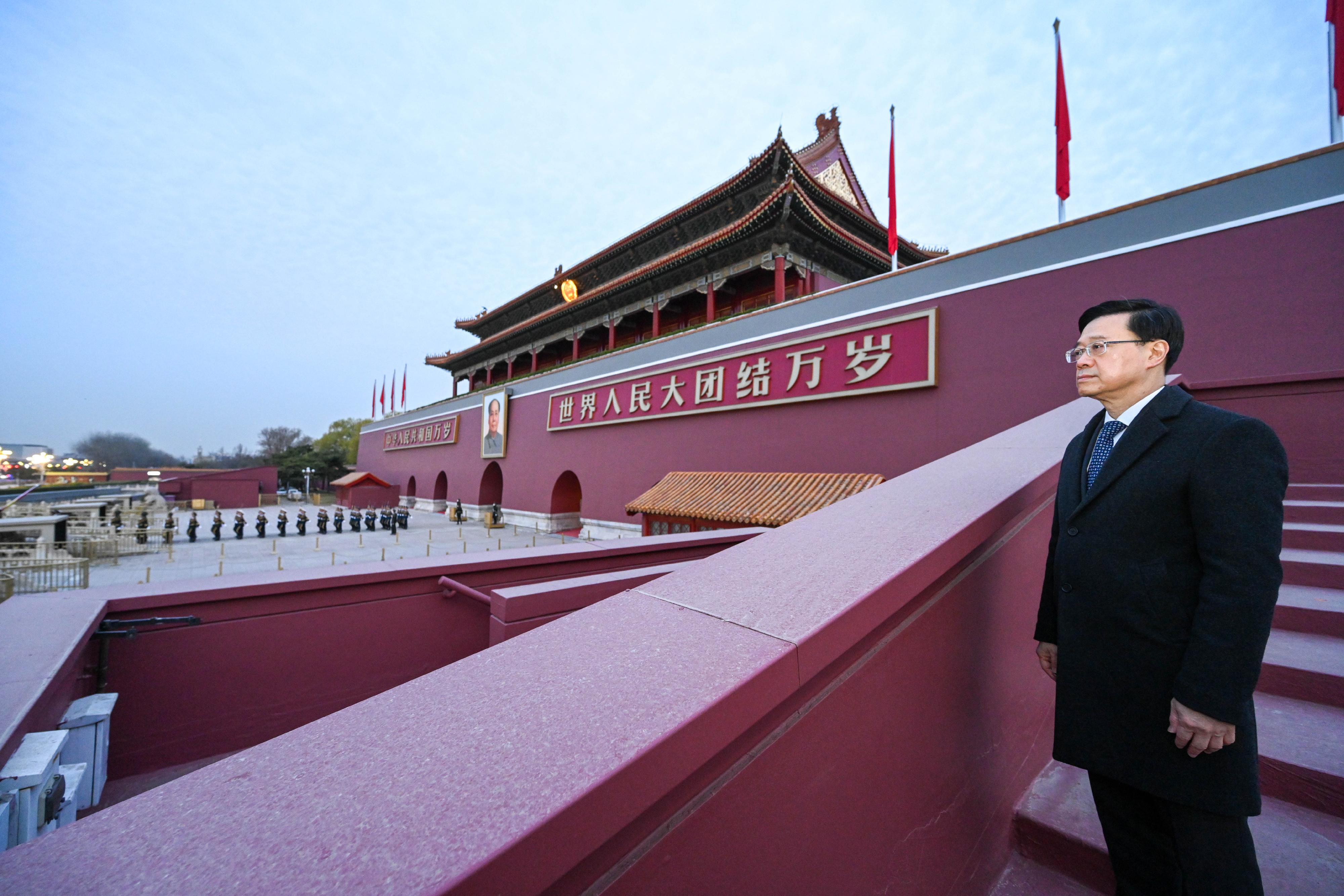 The Chief Executive, Mr John Lee, attends the flag-raising ceremony at Tiananmen Square in Beijing today (March 17). 