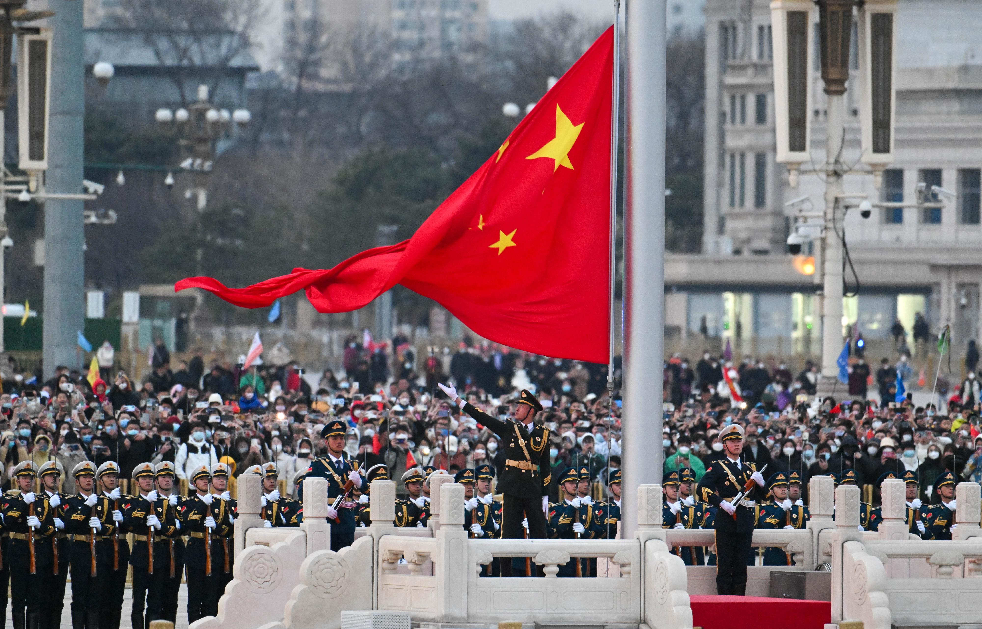 The Chief Executive, Mr John Lee, attends the flag-raising ceremony at Tiananmen Square in Beijing today (March 17).