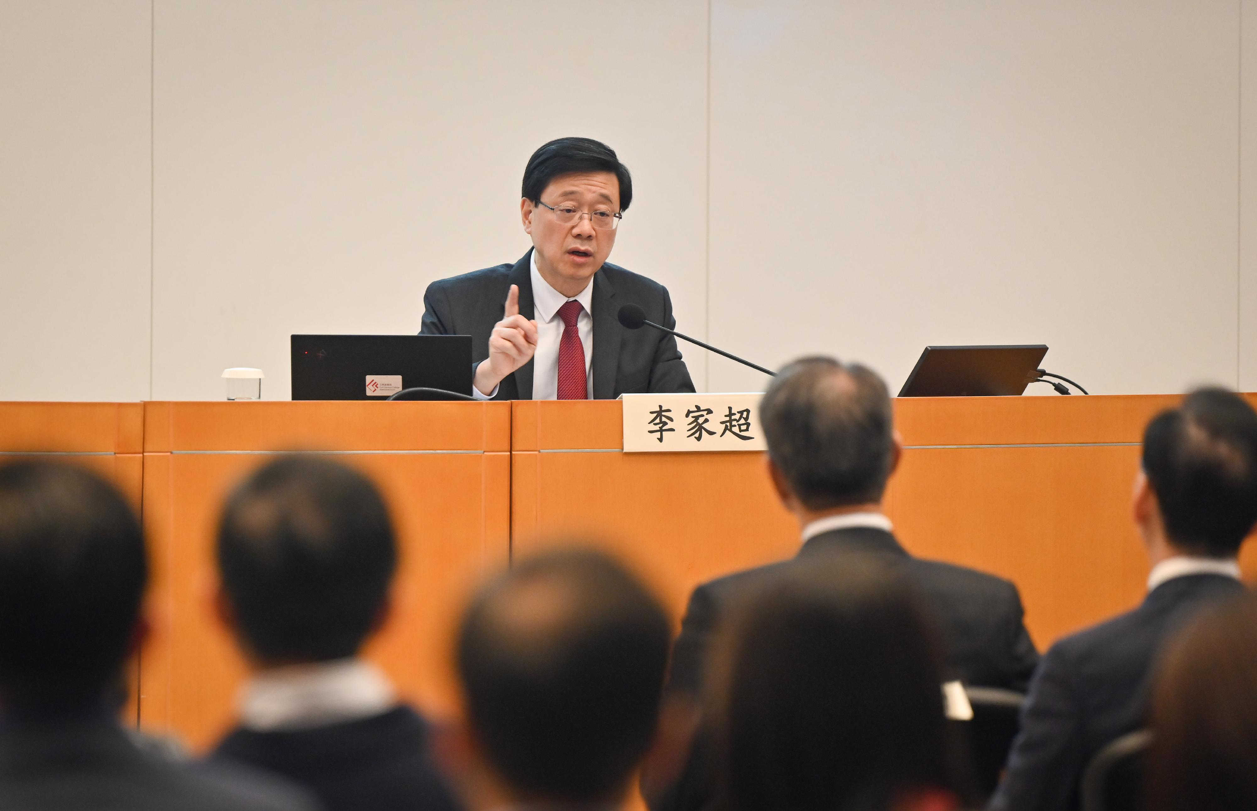 The Hong Kong Special Administrative Region Government today (March 24) held a sharing session on the spirit of "two sessions" at the Central Government Offices. Photo shows the Chief Executive, Mr John Lee, speaking at the sharing session.