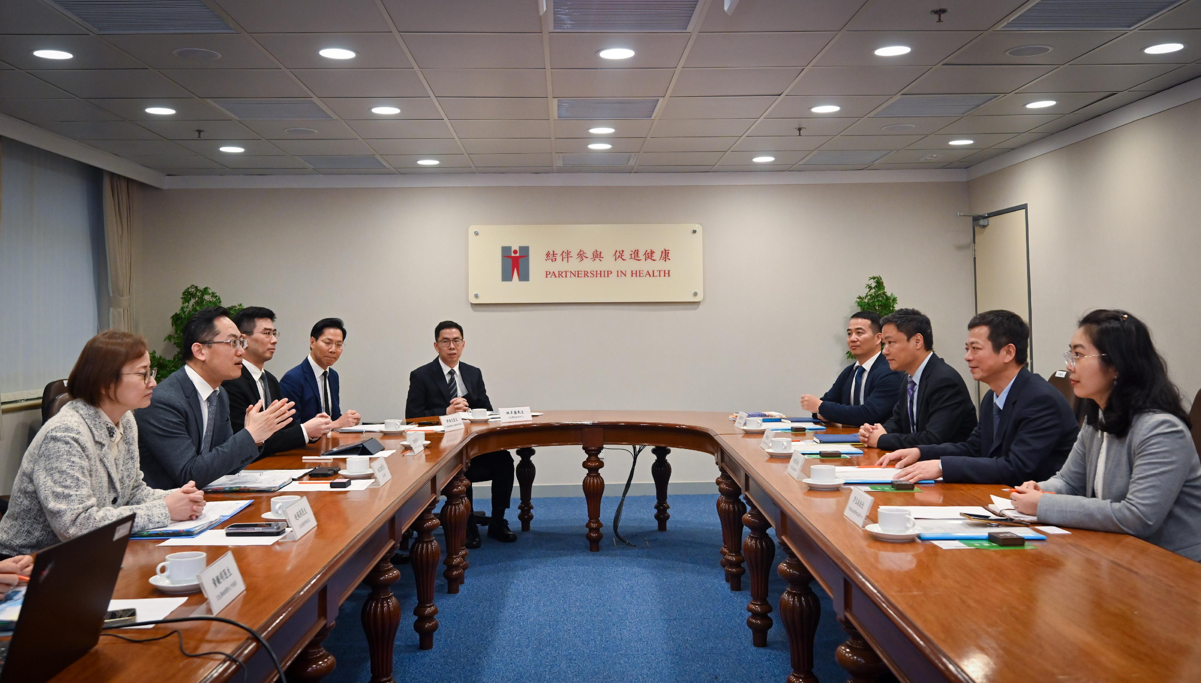 The Director of Health, Dr Ronald Lam (second left), today (March 27) met with a delegation led by the General Director of the Guangdong Provincial Medical Products Administration, Mr Jiang Xiaodong (second right). At the meeting, there was in-depth discussion on collaboration in areas of Chinese medicine development, and the measure of using Hong Kong registered drugs and medical devices used in Hong Kong public hospitals in Guangdong-Hong Kong-Macao Greater Bay Area. The Controller of Regulatory Affairs of the Department of Health, Dr Amy Chiu (first left), also attended the meeting.