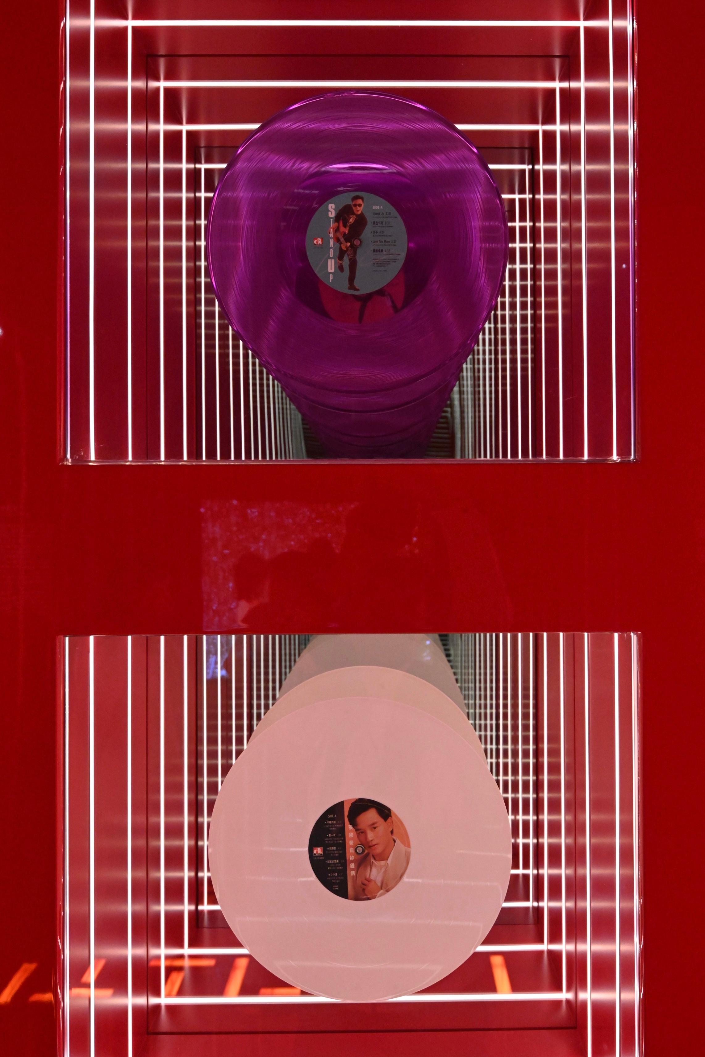The opening ceremony for the "Miss You Much Leslie Exhibition" was held today (March 28) at the Hong Kong Heritage Museum. Photo shows Leslie Cheung’s vinyl records of “Stand Up” (Purple Edition) (top) and “For Your Heart Only” (White Edition) (bottom).
