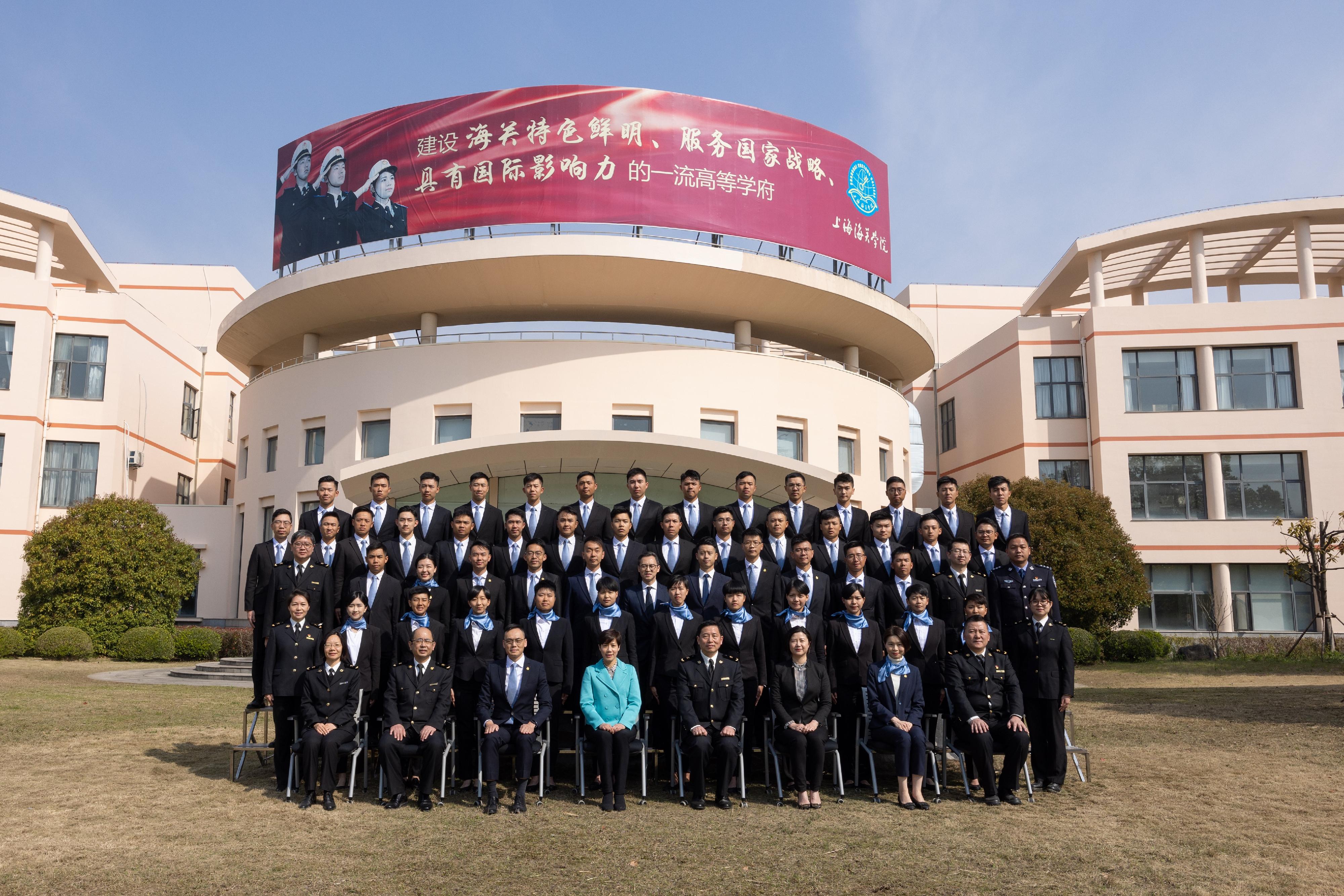 The Commissioner of Customs and Excise, Ms Louise Ho, started her visit to Shanghai, Beijing, and the Guangdong-Hong Kong-Macao Greater Bay Area on March 26. Photo shows Ms Ho (front row, fourth left) with Inspectors after officiating at the opening ceremony of the First Inspector Induction Course: National and Mainland Customs Operations Studies held at the Shanghai Customs College yesterday morning (March 27).