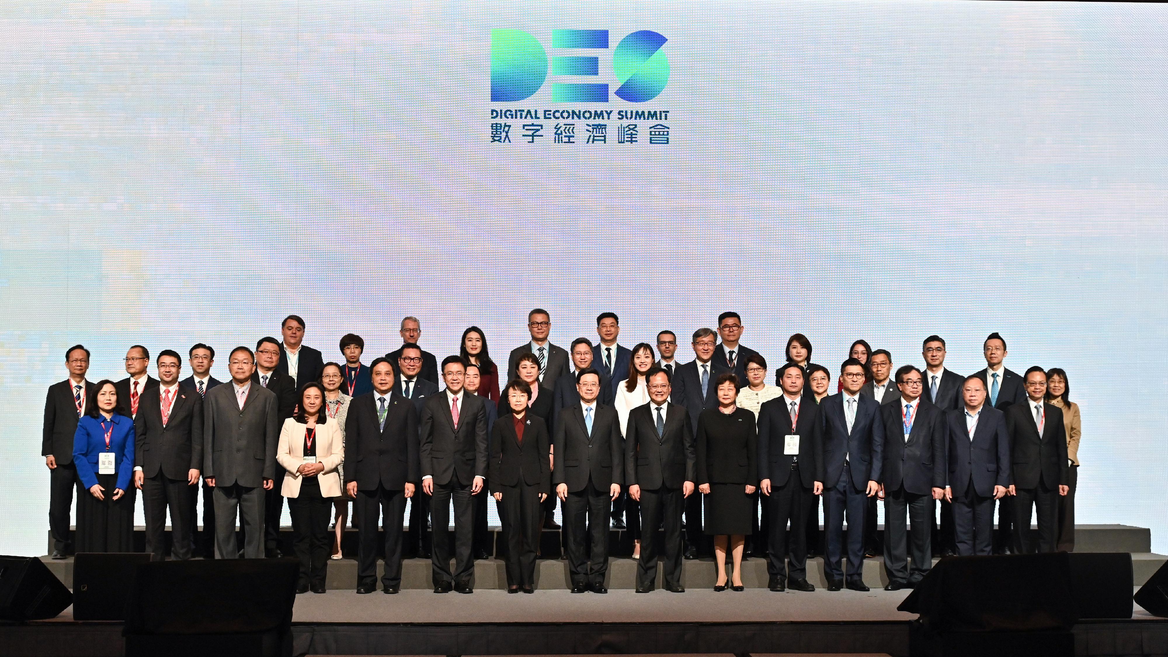 The Chief Executive, Mr John Lee, attended the Digital Economy Summit 2023 today (April 13). Photo shows (first row, from fifth left) the Chairman of the Board of Directors of Hong Kong Cyberport Management Company Limited, Mr Simon Chan; the Secretary for Innovation, Technology and Industry, Professor Sun Dong; Deputy Director of the Cyberspace Administration of China Ms Cao Shumin; Mr Lee; Deputy Minister of the Liaison Office of the Central People's Government in the Hong Kong Special Administrative Region Mr Chen Dong; the President of the China Internet Development Foundation, Ms Wang Xiujun; the Party Secretary and Director-General of Guangdong Provincial Administration of Government Service and Data, Mr Yang Pengfei, and other guests at the summit.