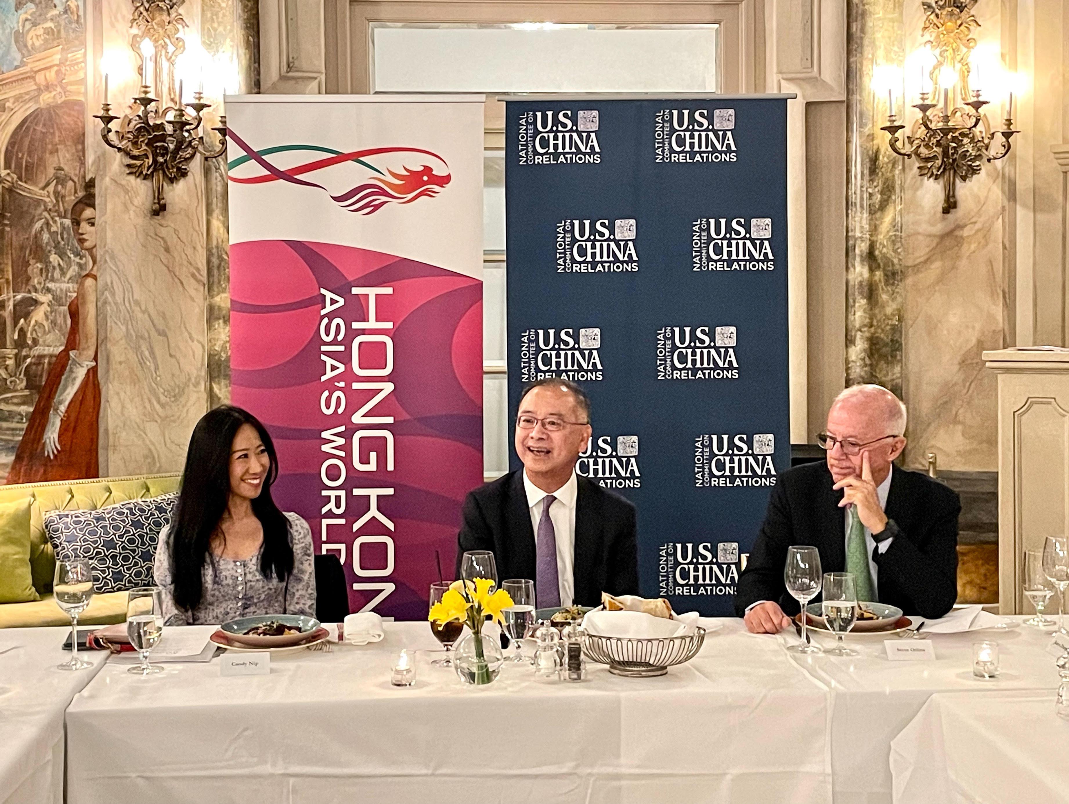 The Chief Executive of the Hong Kong Monetary Authority, Mr Eddie Yue (centre), spoke at a luncheon organised by the Hong Kong Economic and Trade Office, New York (HKETONY), and the National Committee on US-China Relations (NCUSCR) in New York on April 12 (New York time). Photo shows the Director of HKETONY, Ms Candy Nip (left), and the President of the NCUSCR, Mr Stephen Orlins (right). 