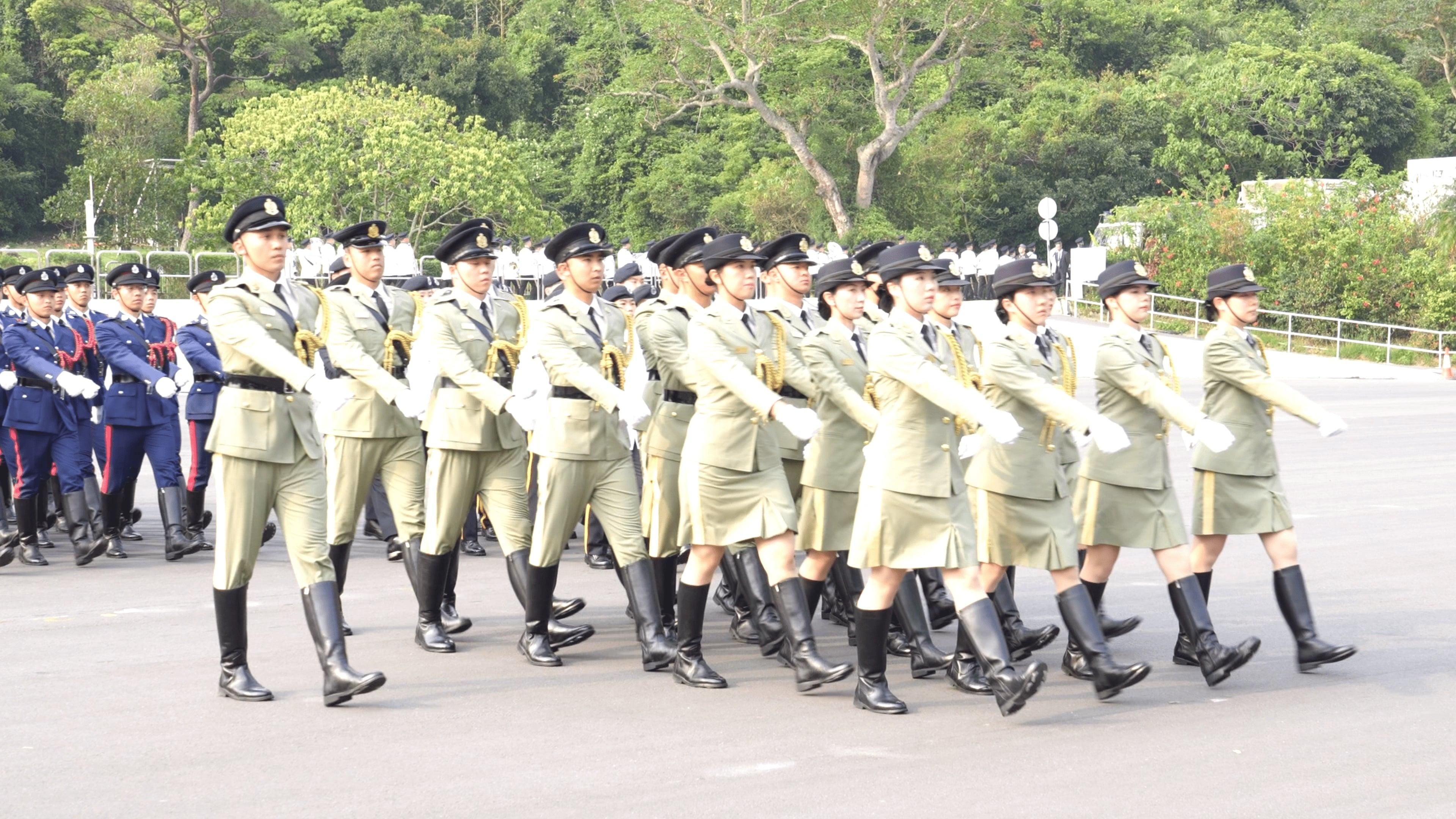 保安局及轄下紀律部隊今日（四月十五日）於香港警察學院聯合舉行「全民國家安全教育日」升旗儀式。圖示紀律部隊儀仗隊步操進場。