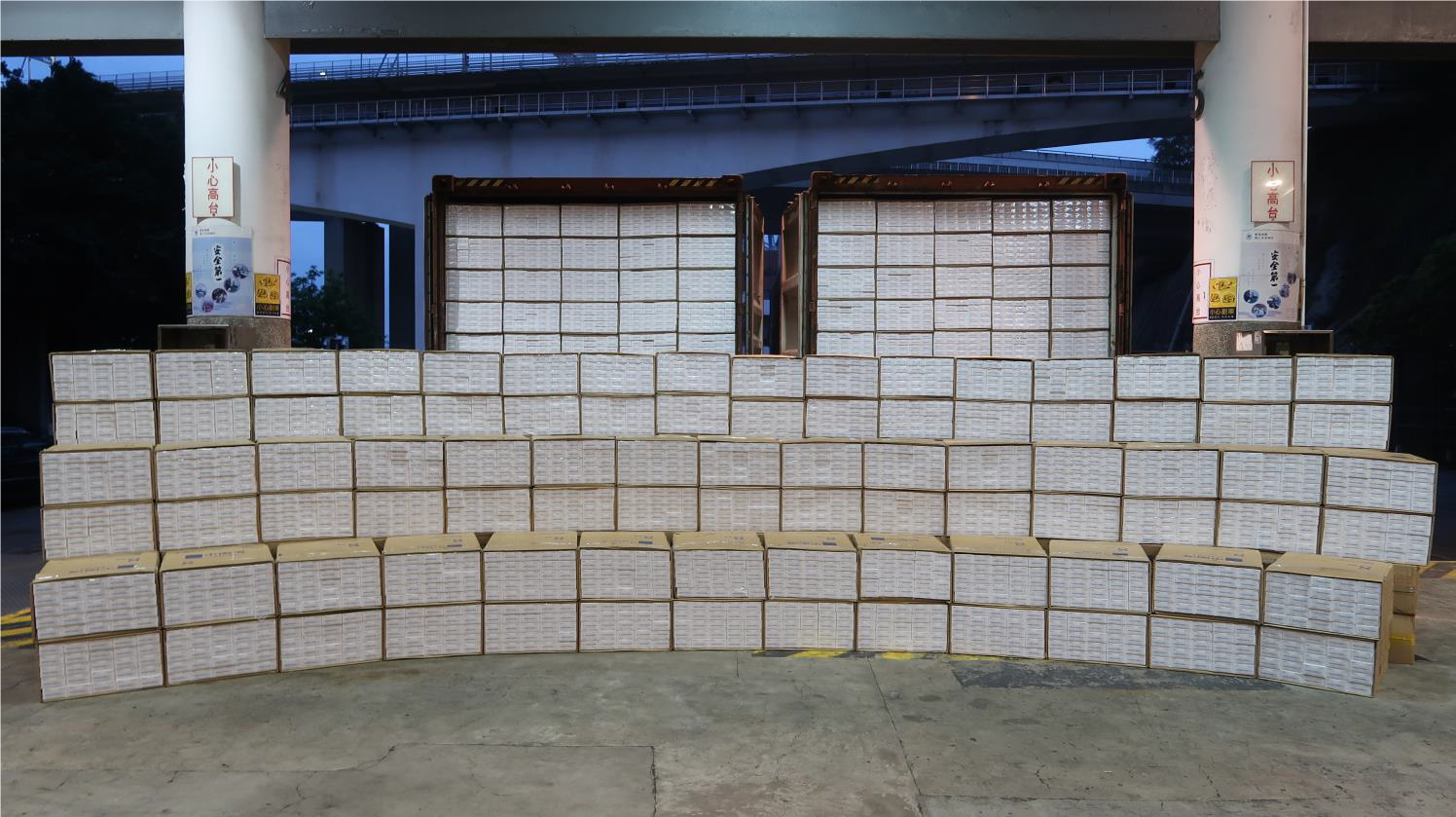 Hong Kong Customs on April 13 detected a suspected illicit cigarette smuggling case involving a barge in the waters off Tsing Yi. About 20 million suspected illicit cigarettes with an estimated market value of about $74 million and a duty potential of about $50 million were seized. Photo shows the suspected illicit cigarettes seized.