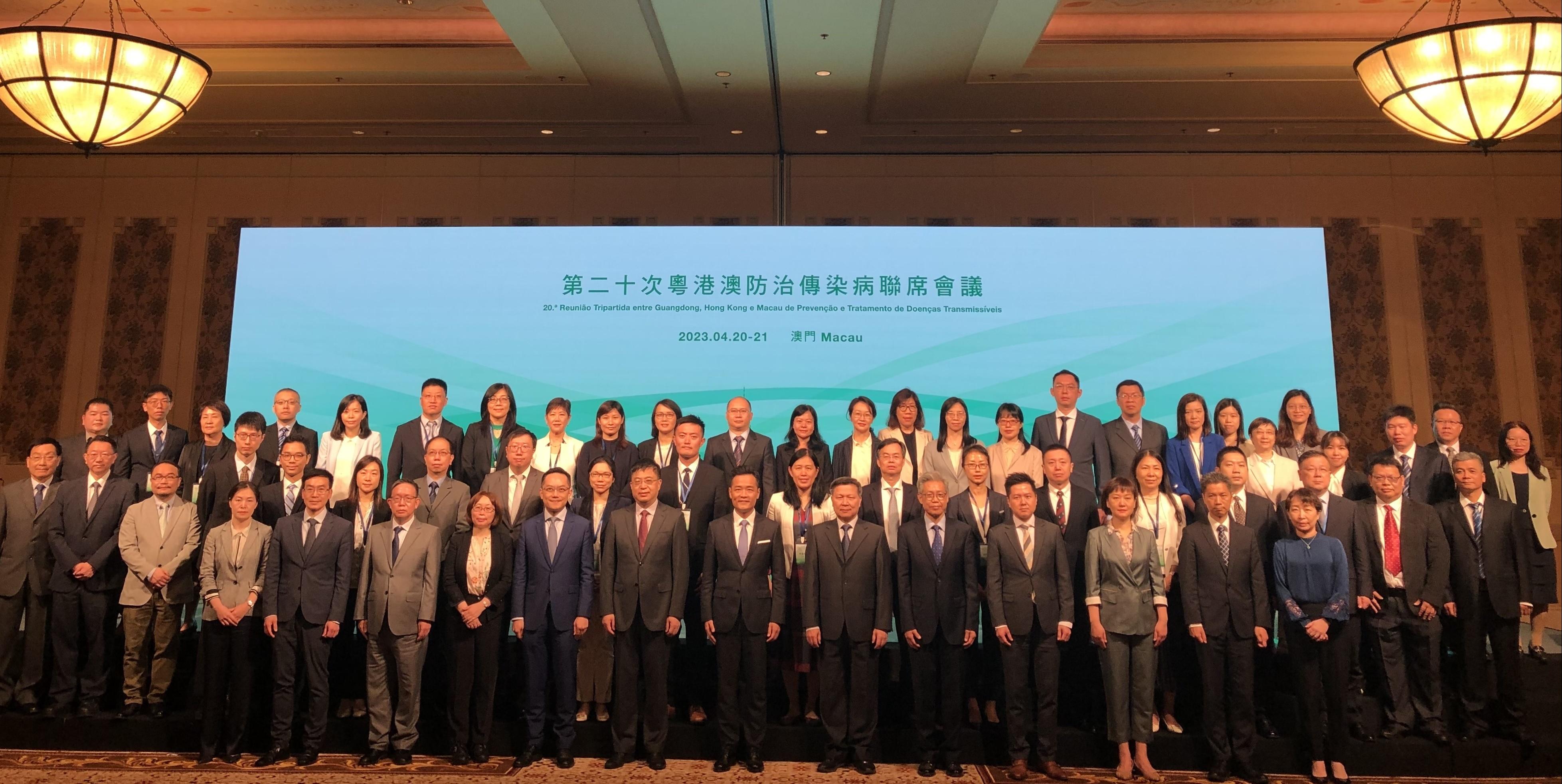 The two-day 20th Tripartite Meeting on Prevention and Control of Communicable Diseases successfully concluded in Macao today (April 21). The Director-General of the Department of Publicity and Culture of the Liaison Office of the Central People's Government in the Macao Special Administrative Region, Mr Wan Sucheng (front row, sixth left); the Director of the Health Bureau of Macao, Dr Lo Iek-long (front row, centre); Deputy Director General of the Health Commission of Guangdong Province Mr Huang Fei (front row, sixth right); the Director of Health, Dr Ronald Lam (front row, fifth left); the Controller of the Centre for Health Protection of the Department of Health, Dr Edwin Tsui (front row, fourth right); and representatives from the three places are gathered at the opening session of the meeting.