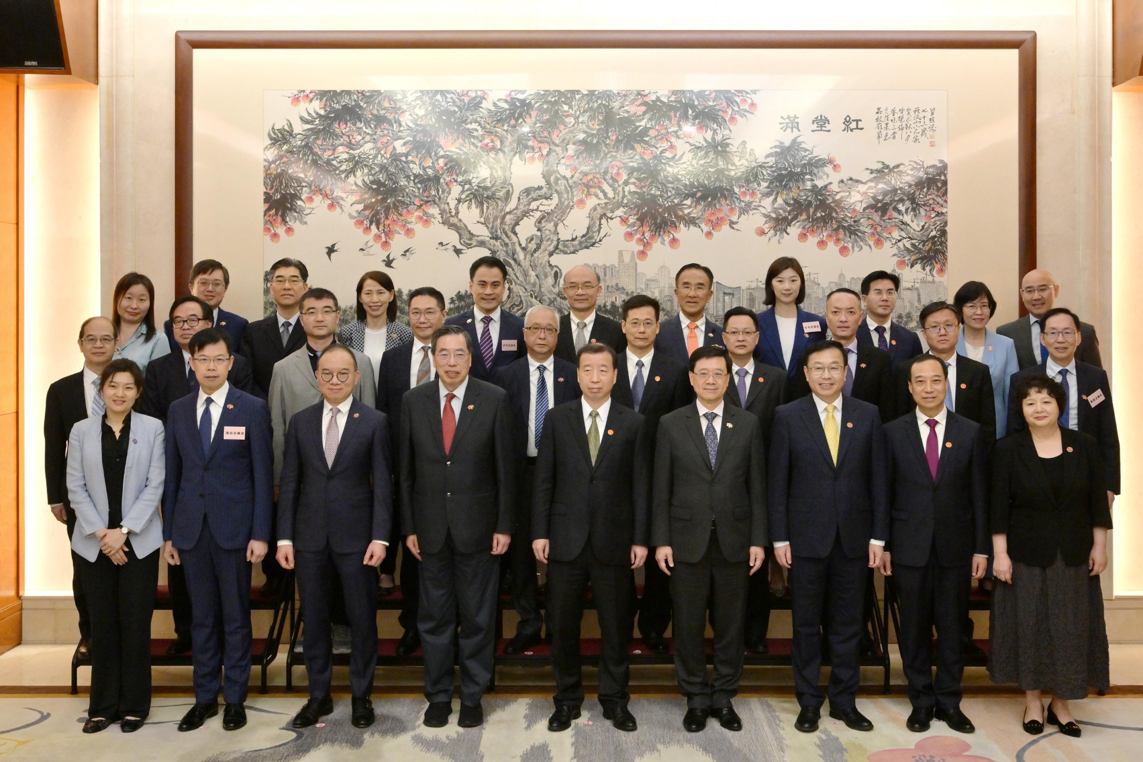 The Chief Executive, Mr John Lee, led a delegation of the Hong Kong Special Administrative Region Government and the Legislative Council to visit Dongguan today (April 22). Photo shows Mr Lee (front row, fourth right) meeting the Secretary of the CPC Dongguan Municipal Committee, Mr Xiao Yafei (front row, fifth right); the Mayor of the Dongguan Municipal Government, Mr Lyu Chengxi (front row, second right); the Deputy Director of the  Liaison Office of the Central People's Government in the Hong Kong Special Administrative Region, Mr He Jing (front row, third right); the Director General of the Hong Kong and Macao Affairs Office of the People's Government of Guangdong Province, Ms Li Huanchun (front row, first right); and the members of the delegation before the dinner with leaders of Dongguan Municipal Government.