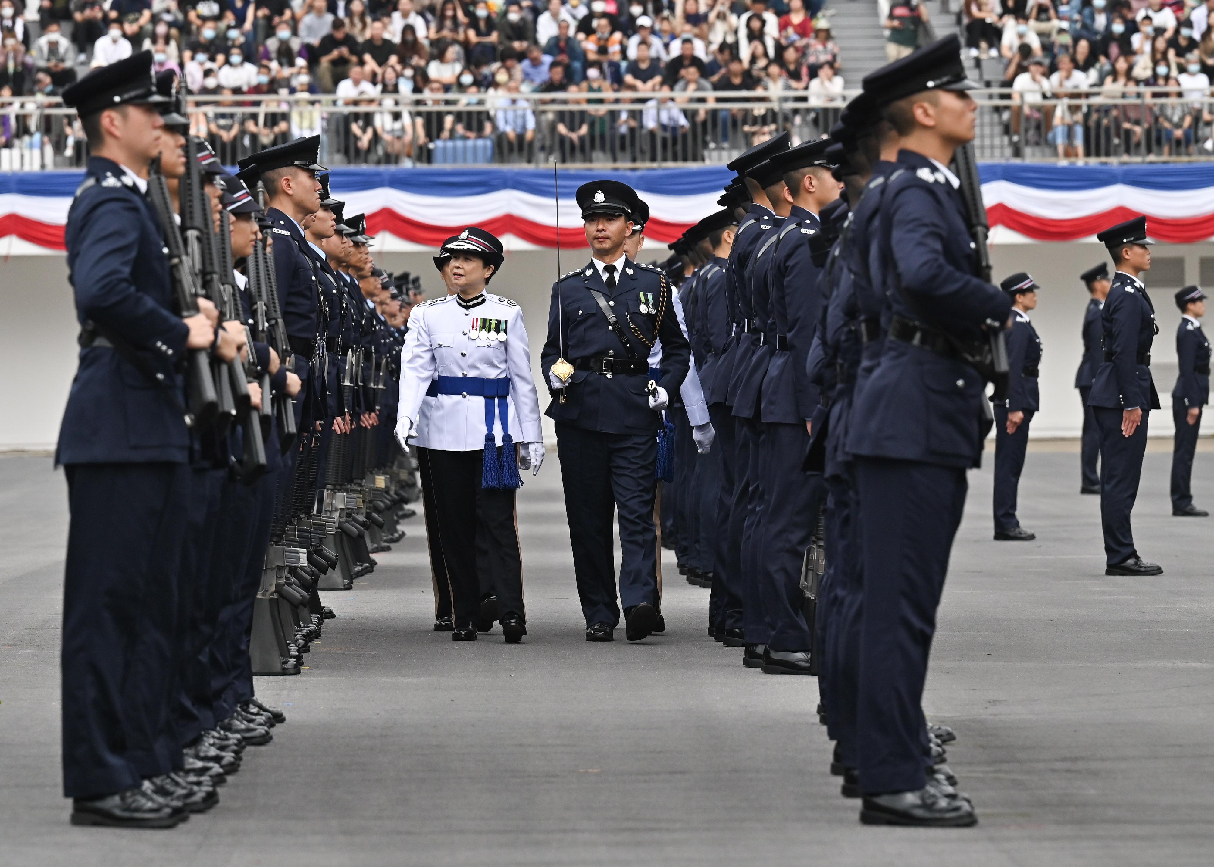The Deputy Commissioner (National Security), Ms Lau Chi-wai, today (April 22) inspects a passing-out parade of 33 probationary inspectors and 123 recruit police constables at the Hong Kong Police College.