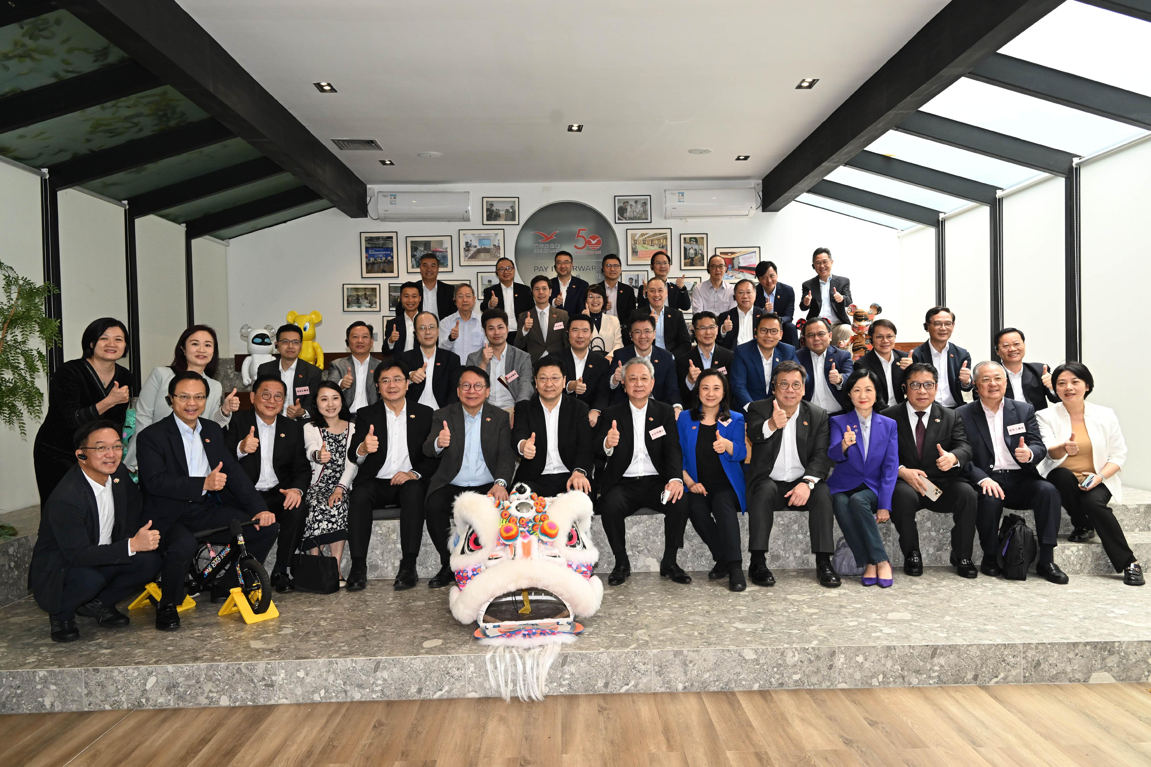 The delegation of the Hong Kong Special Administrative Region Government and the Legislative Council (LegCo) led by the Chief Executive, Mr John Lee, conducted their third-day visit in the Guangdong-Hong Kong-Macao Greater Bay Area today (April 23). Photo shows the Chief Secretary for Administration, Mr Chan Kwok-ki (first row, sixth left); the Secretary for Commerce and Economic Development, Mr Algernon Yau (first row, fifth right); the Secretary for Innovation, Technology and Industry, Professor Sun Dong (second row, seventh right); and LegCo members at the Jian's Villa located at the Foshan Lingnan Tiandi.