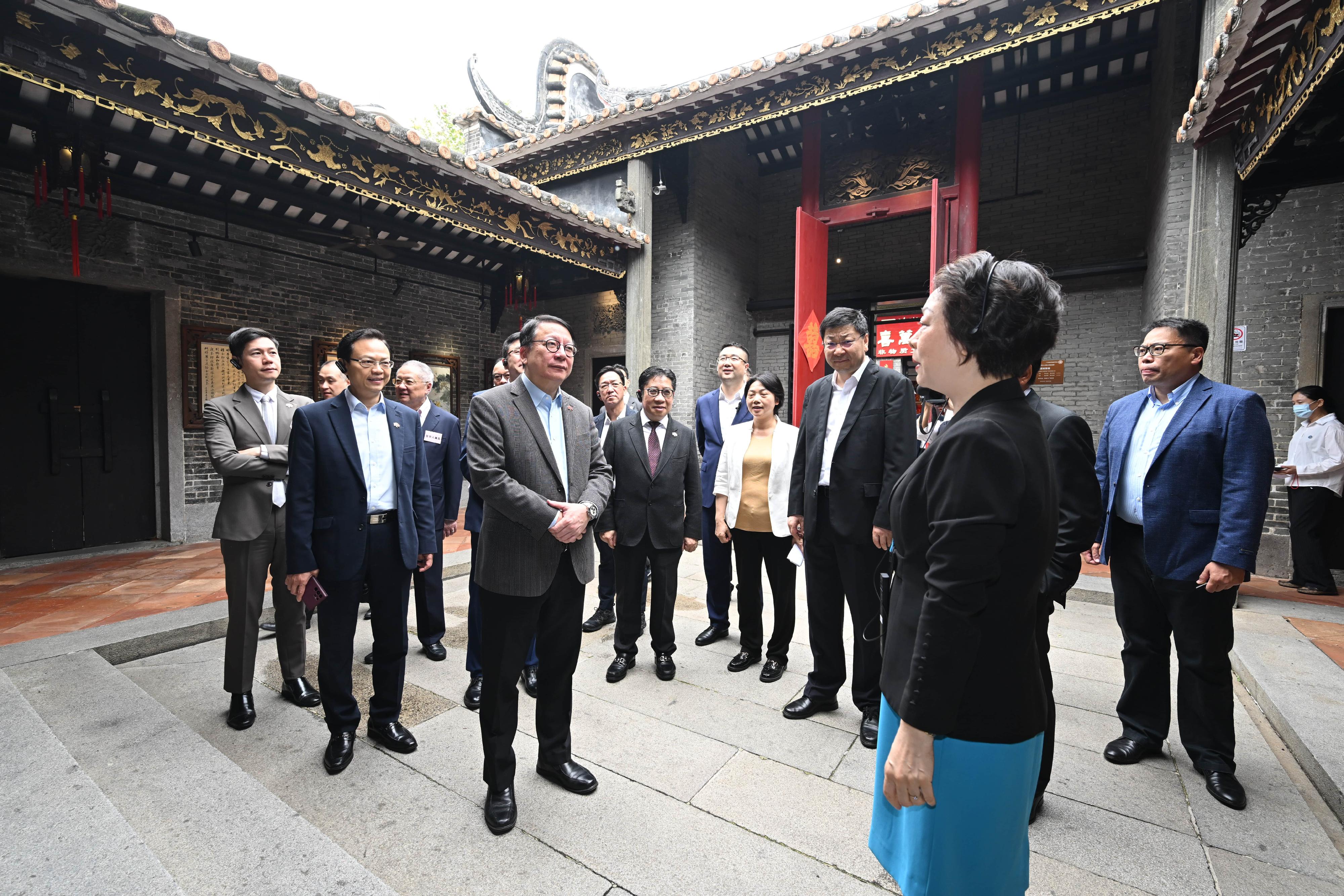The delegation of the Hong Kong Special Administrative Region Government and the Legislative Council (LegCo) led by the Chief Executive, Mr John Lee, conducted their third-day visit in the Guangdong-Hong Kong-Macao Greater Bay Area today (April 23). Photo shows the Chief Secretary for Administration, Mr Chan Kwok-ki (third left) and LegCo members visiting the Wenhui Lane Marriage House located at the Foshan Lingnan Tiandi.