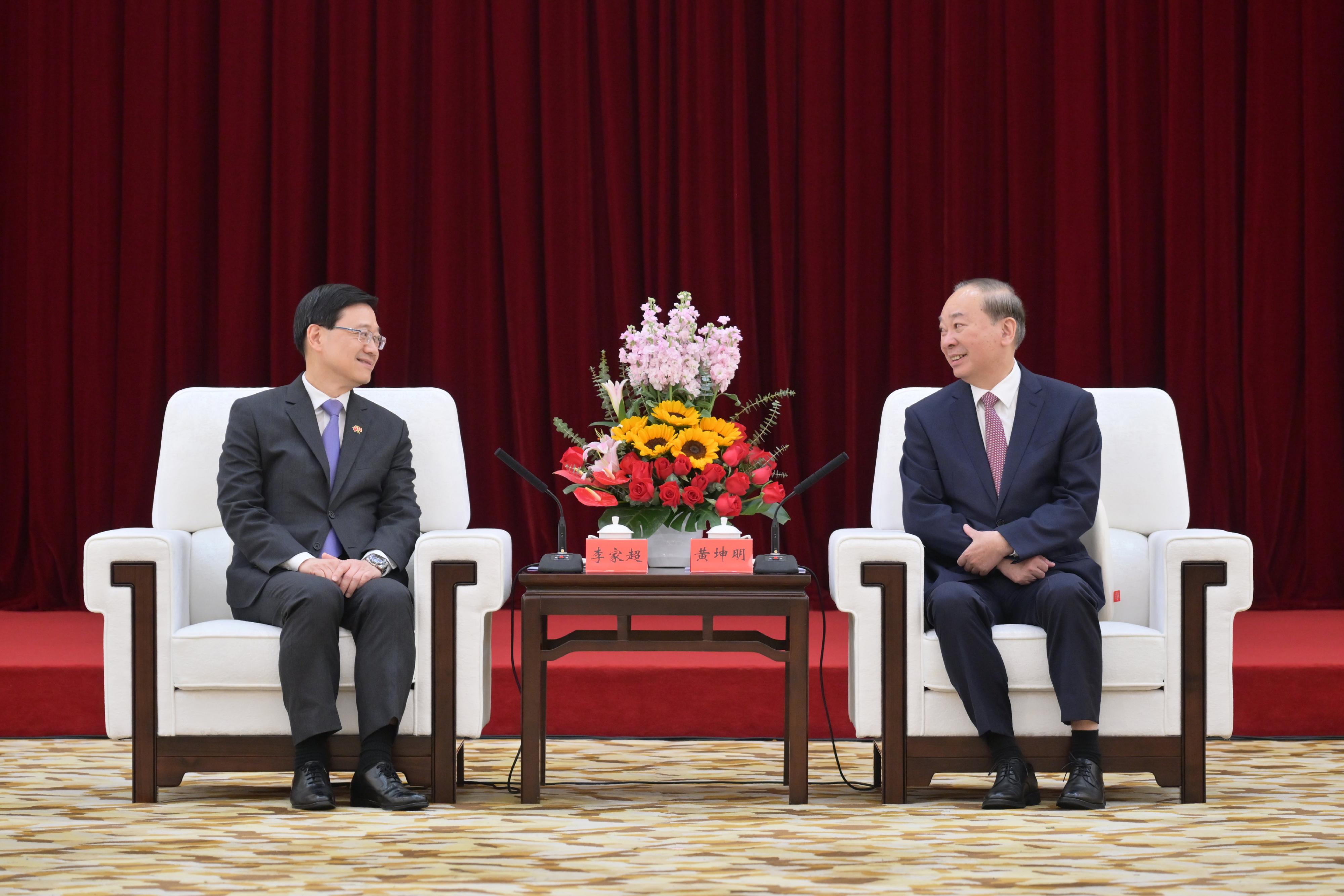 The Chief Executive, Mr John Lee, led a delegation of the Hong Kong Special Administrative Region Government and the Legislative Council to visit Guangzhou today (April 24). Photo shows Mr Lee (left) meeting with the Secretary of the CPC Guangdong Provincial Committee, Mr Huang Kunming (right), in Guangzhou.