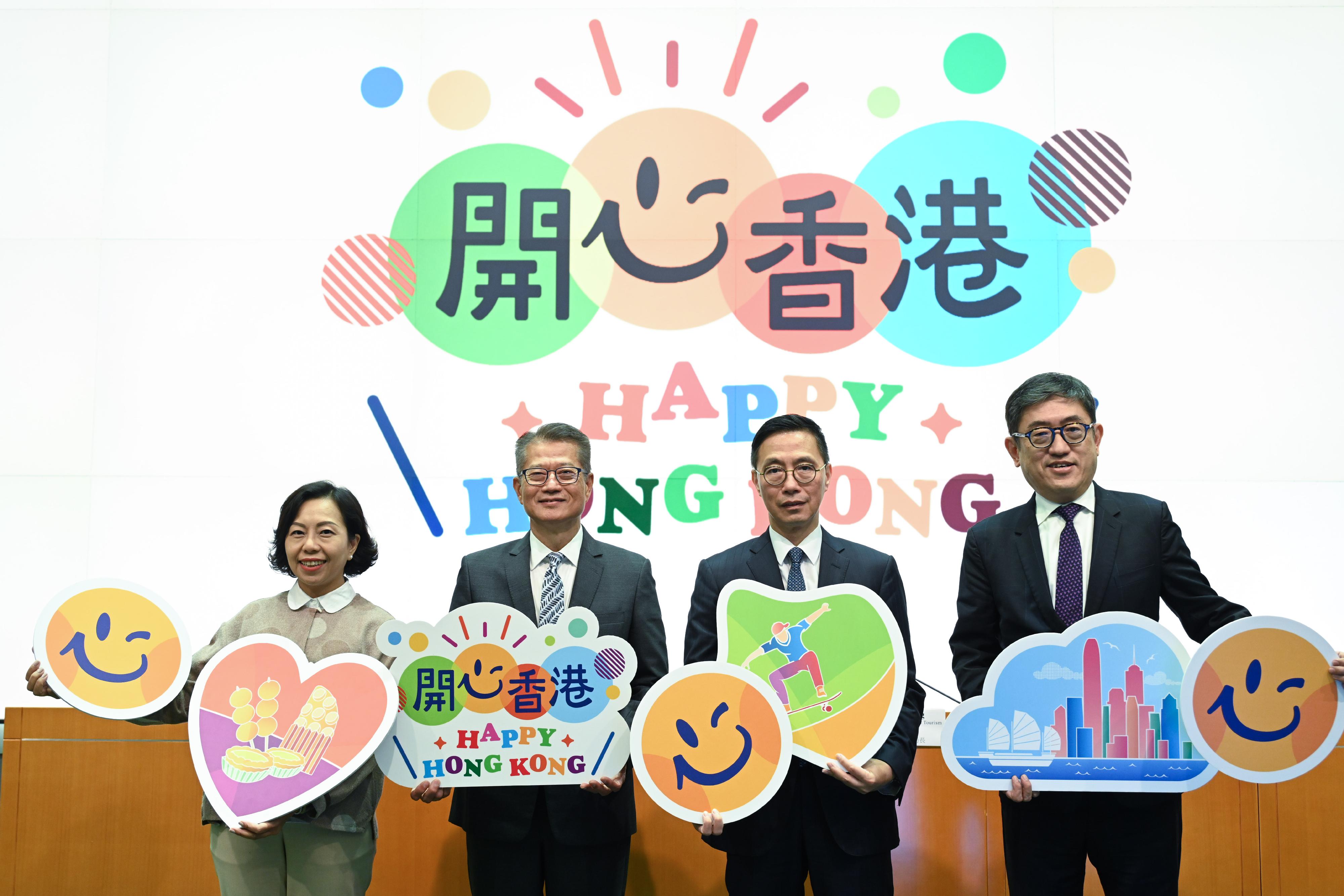 The Financial Secretary, Mr Paul Chan (second left), holds a press conference today (April 24) on the "Happy Hong Kong" Campaign at the Central Government Offices in Tamar. Also in attendance are the Secretary for Culture, Sports and Tourism, Mr Kevin Yeung (second right); the Secretary for Home and Youth Affairs, Miss Alice Mak (first left); and the Executive Director of the Hong Kong Tourism Board, Mr Dane Cheng (first right).
