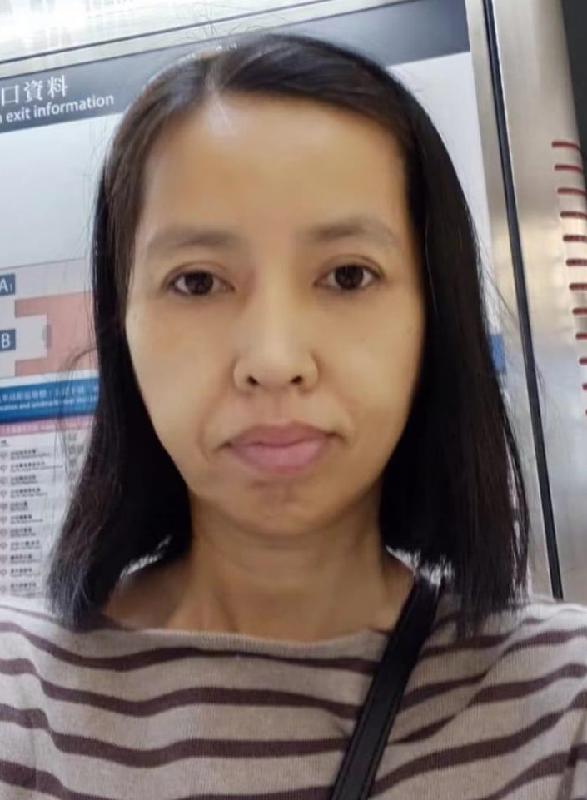 Lam Ting, aged 53, is about 1.56 metres tall, 45 kilograms in weight and of thin build. She has a round face with yellow complexion and short straight black hair. She was last seen wearing an orange short-sleeved shirt, a blue denim skirt and white sports shoes.
