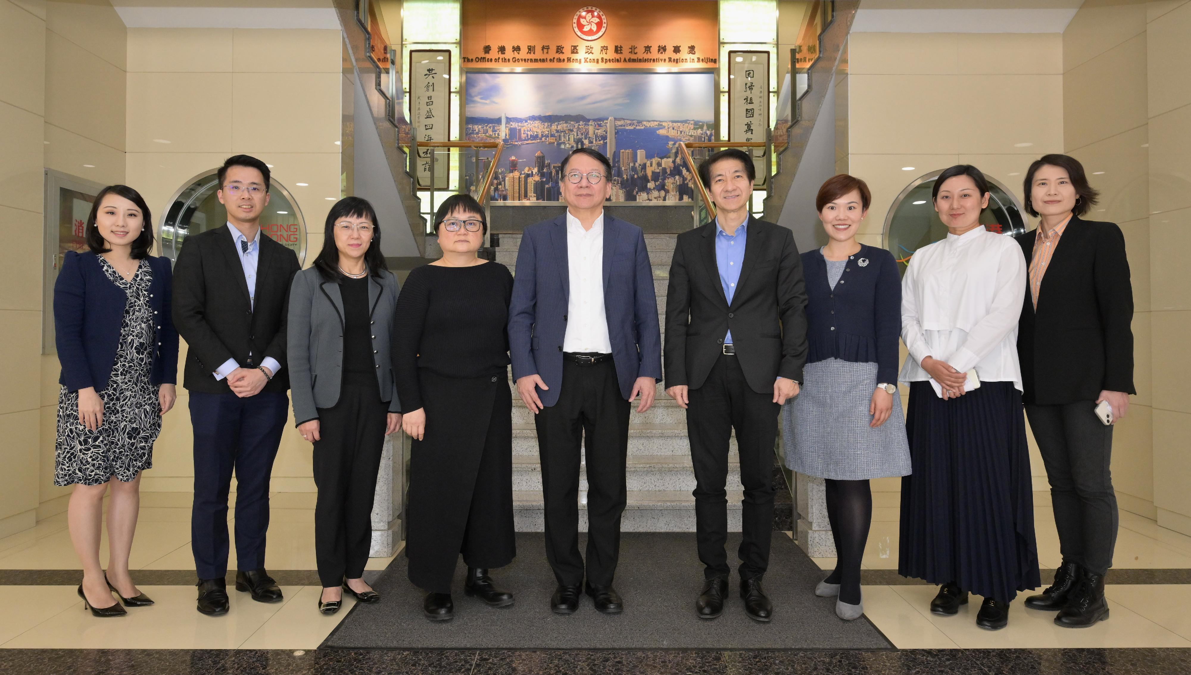 The Chief Secretary for Administration, Mr Chan Kwok-ki, received a briefing in Beijing on the work of the Office of the Government of the Hong Kong Special Administrative Region in Beijing (BJO) today (April 26). Mr Chan (centre) is pictured with the Director of BJO, Mr Rex Chang (fourth right), and other colleagues. 