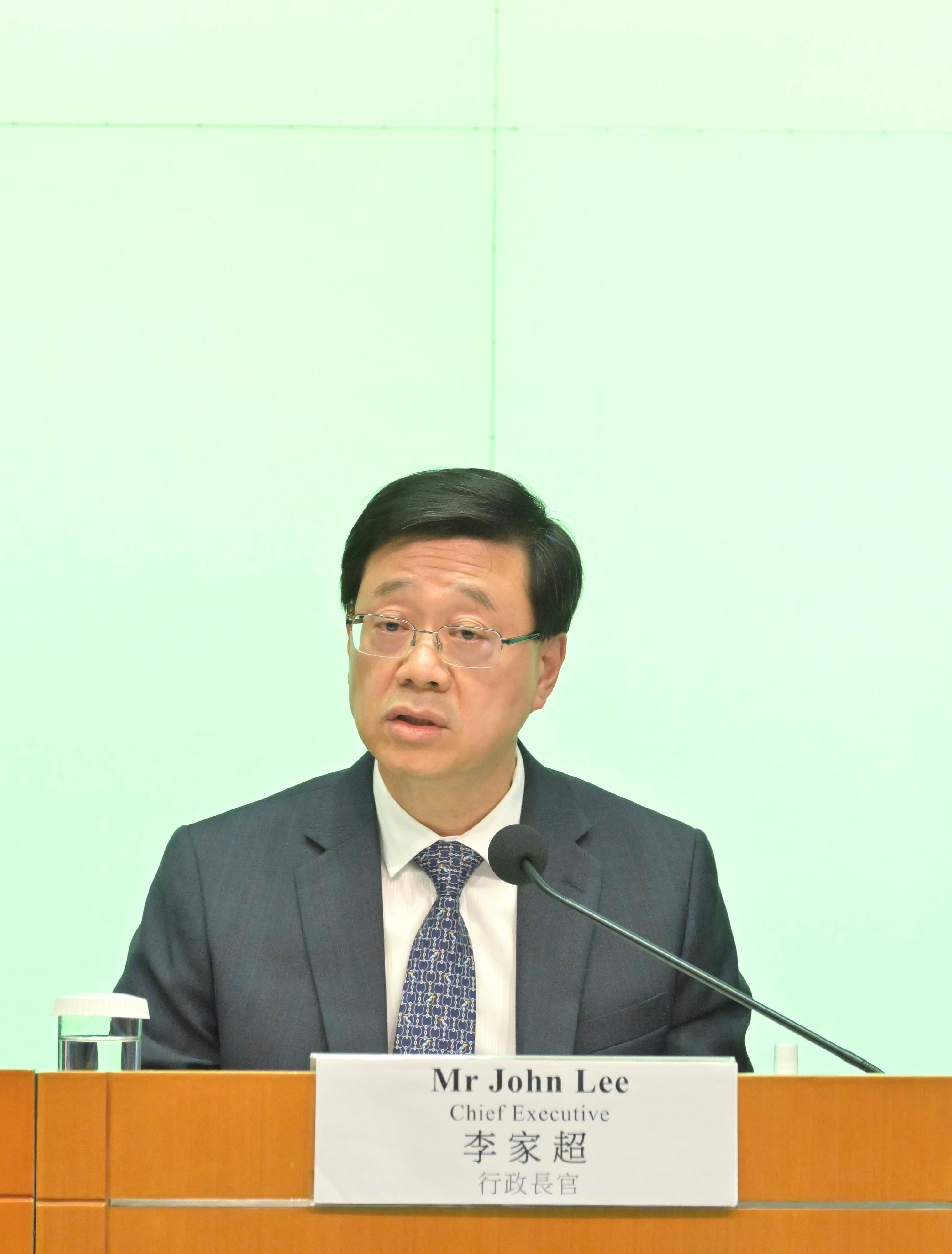 The Chief Executive, Mr John Lee, holds a press conference on the proposal to improve district administration at the Central Government Offices, Tamar, today (May 2). Photo shows Mr Lee responding to questions at the press conference.