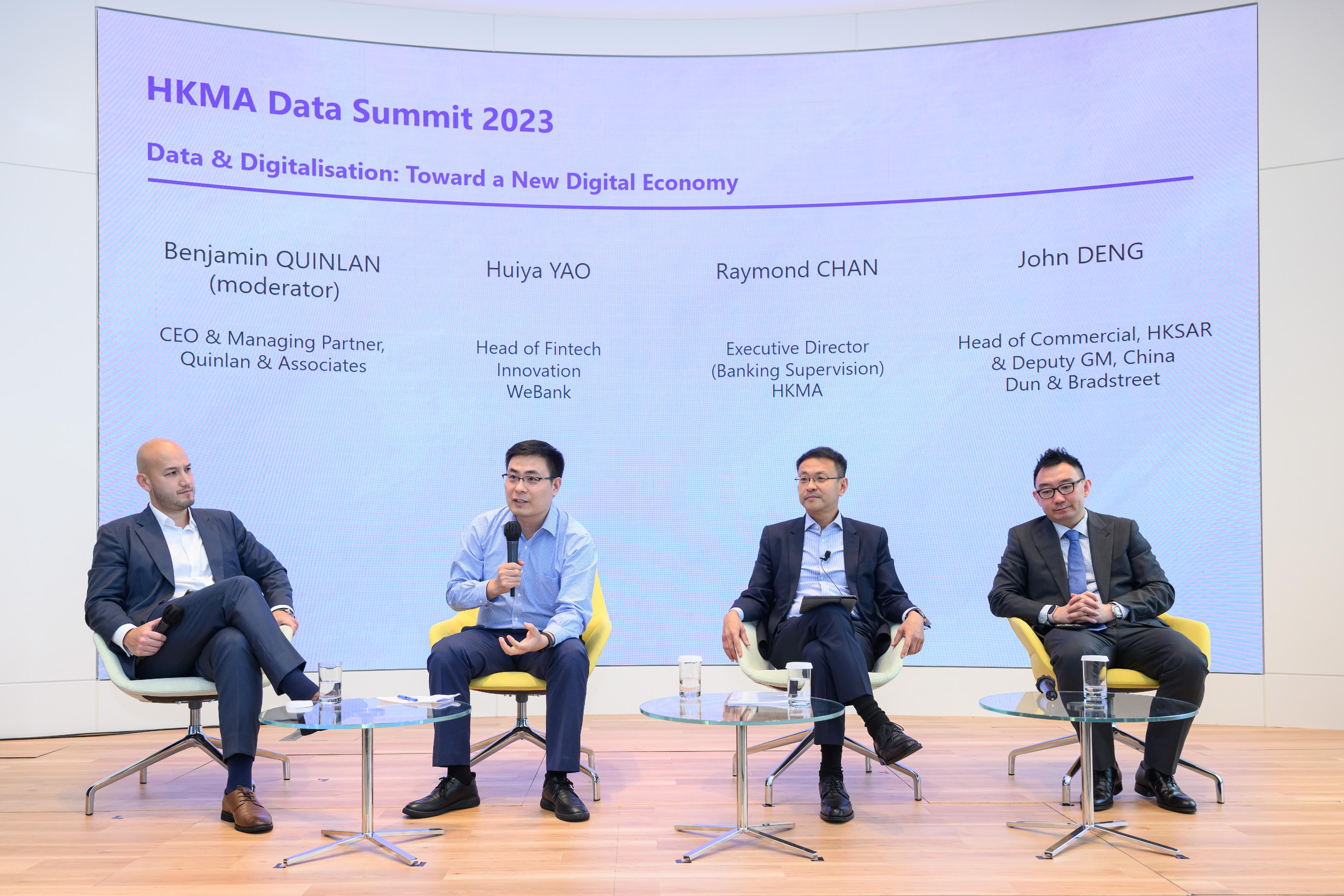 In the panel discussion titled "Data and Digitalisation: Towards a New Digital Economy" at the Data Summit today (May 4), the Executive Director (Banking Supervision) of the Hong Kong Monetary Authority, Mr Raymond Chan (second right); the Head of Commercial, HKSAR & Deputy General Manager, China of Dun & Bradstreet, Mr John Deng (first right); and the Head of Fintech Innovation of WeBank, Mr Yao Huiya (second left), share their views on how the financial services industry can seize the opportunity and strengthen its digital capabilities.