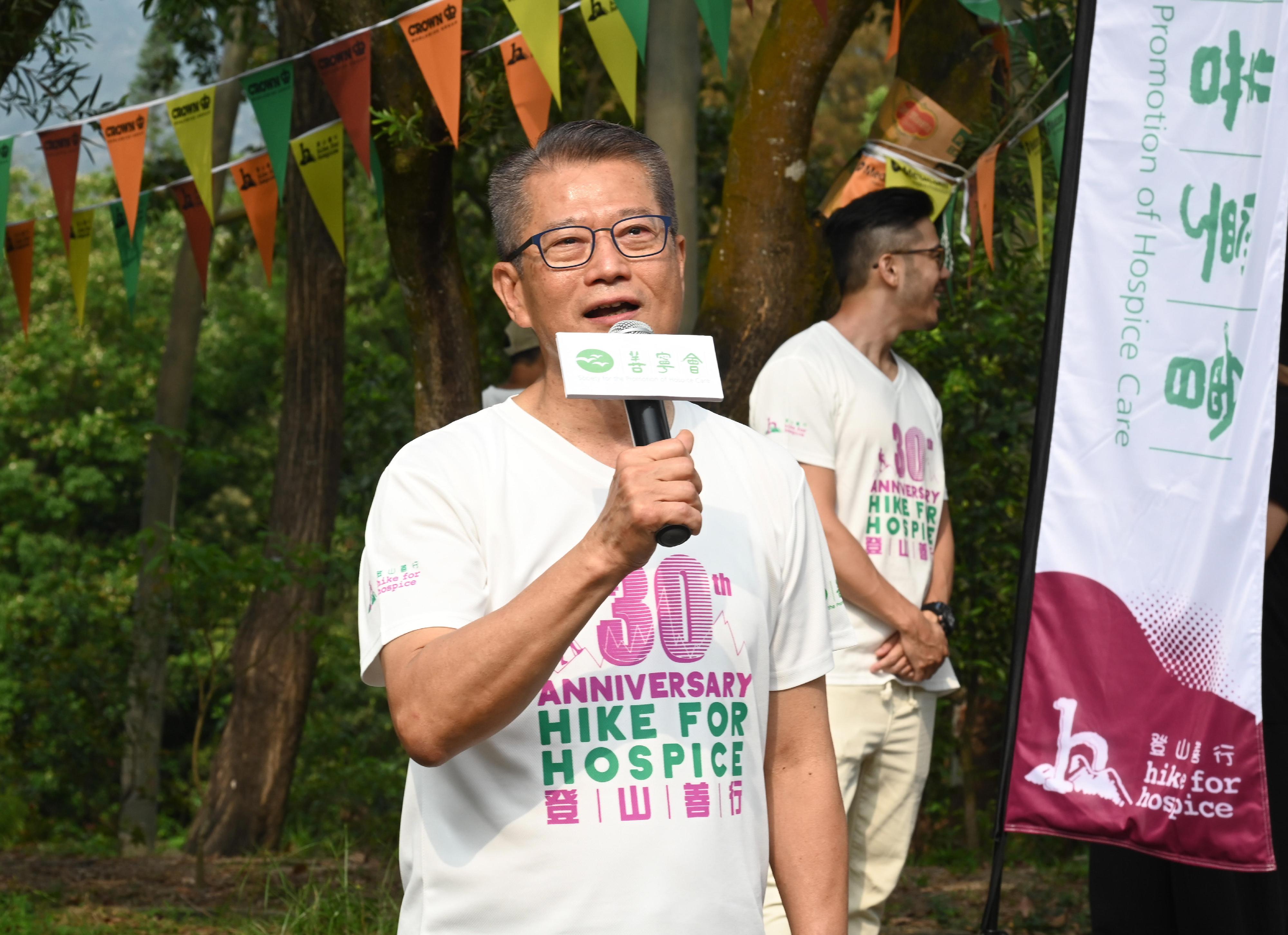 The Financial Secretary, Mr Paul Chan, speaks at the opening ceremony of the 30th Annual Hike for Hospice today (May 7).